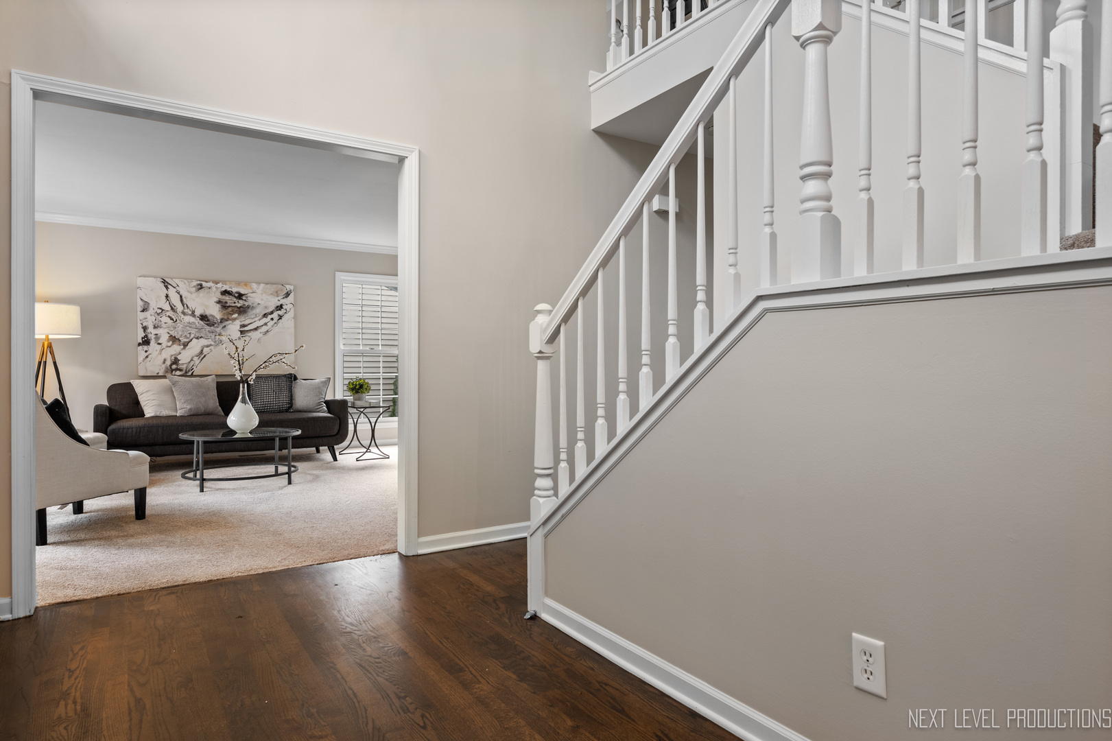 24 River Bend Road Montgomery, IL 60538 - Photo 4 of 36 a view of a hallway with wooden floor and furniture