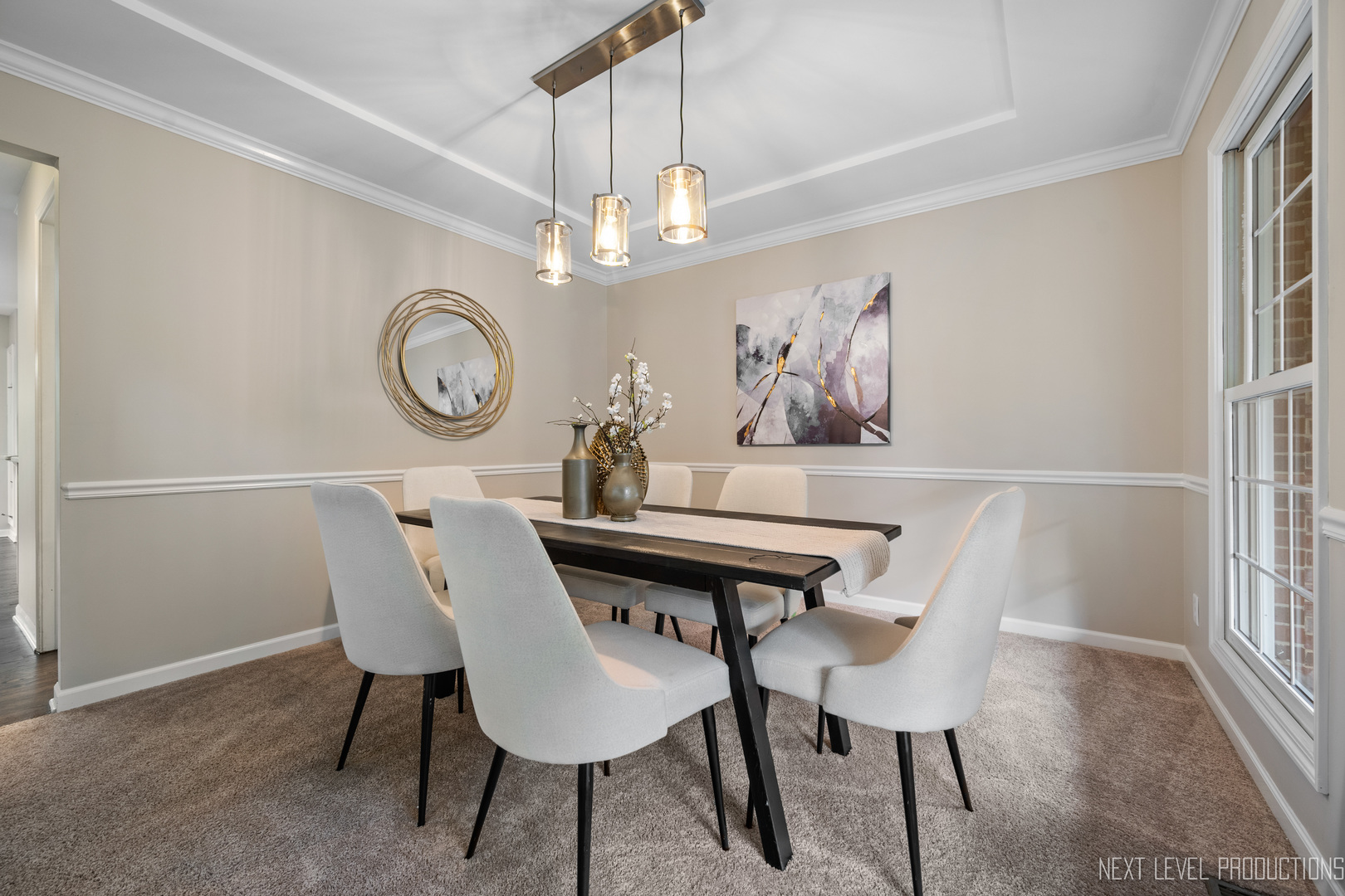24 River Bend Road Montgomery, IL 60538 - Photo 6 of 36 a view of a dining room with furniture and a chandelier