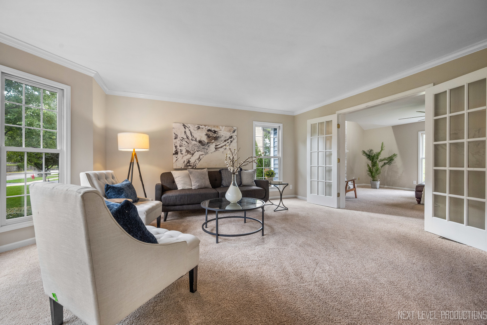 24 River Bend Road Montgomery, IL 60538 - Photo 8 of 36 a living room with furniture and a potted plant