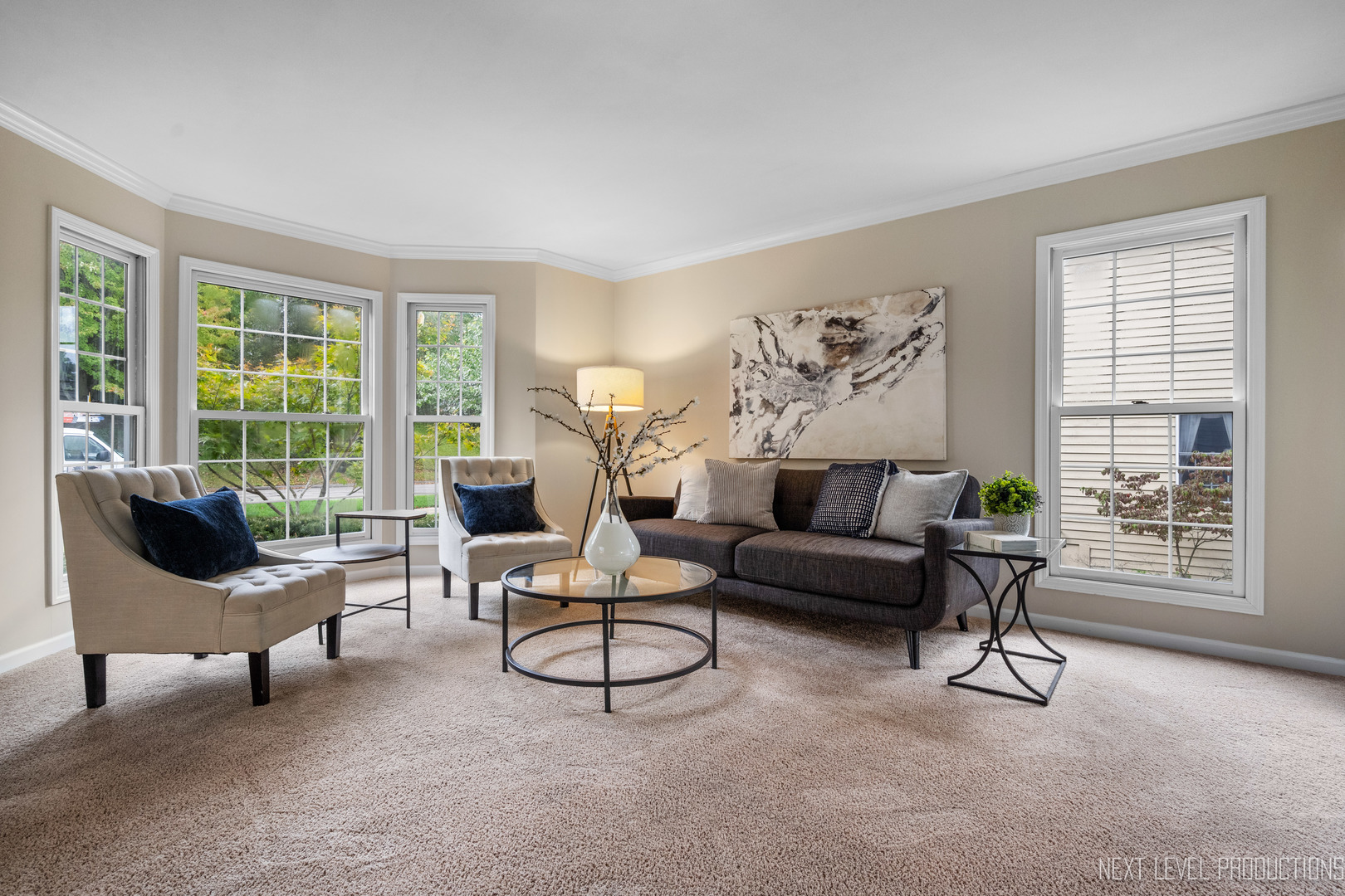 24 River Bend Road Montgomery, IL 60538 - Photo 9 of 36 a living room with furniture and a large window