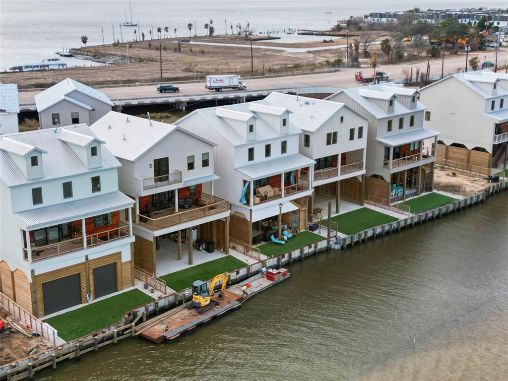 an aerial view of residential building with outdoor space and boat