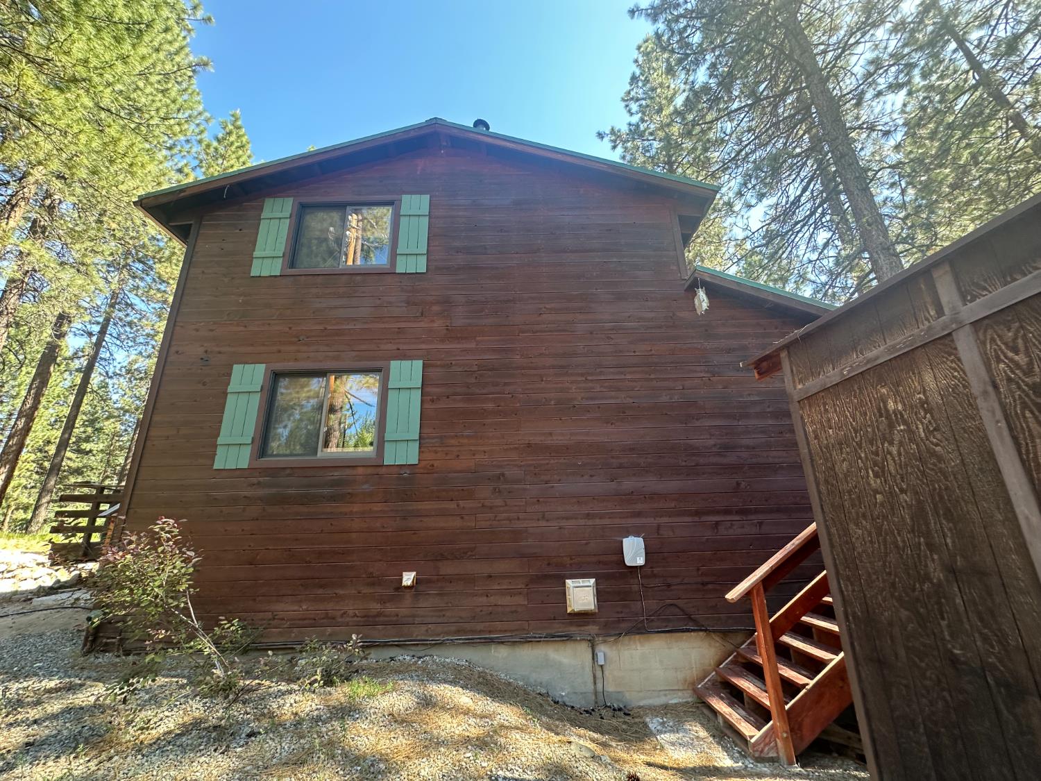 878 Rheinfelder Street Portola, CA 96122 - Photo 2 of 36 a brick building with a large tree