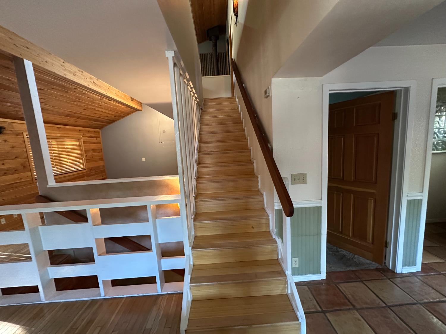 878 Rheinfelder Street Portola, CA 96122 - Photo 22 of 36 a view of entryway with wooden floor and stairs