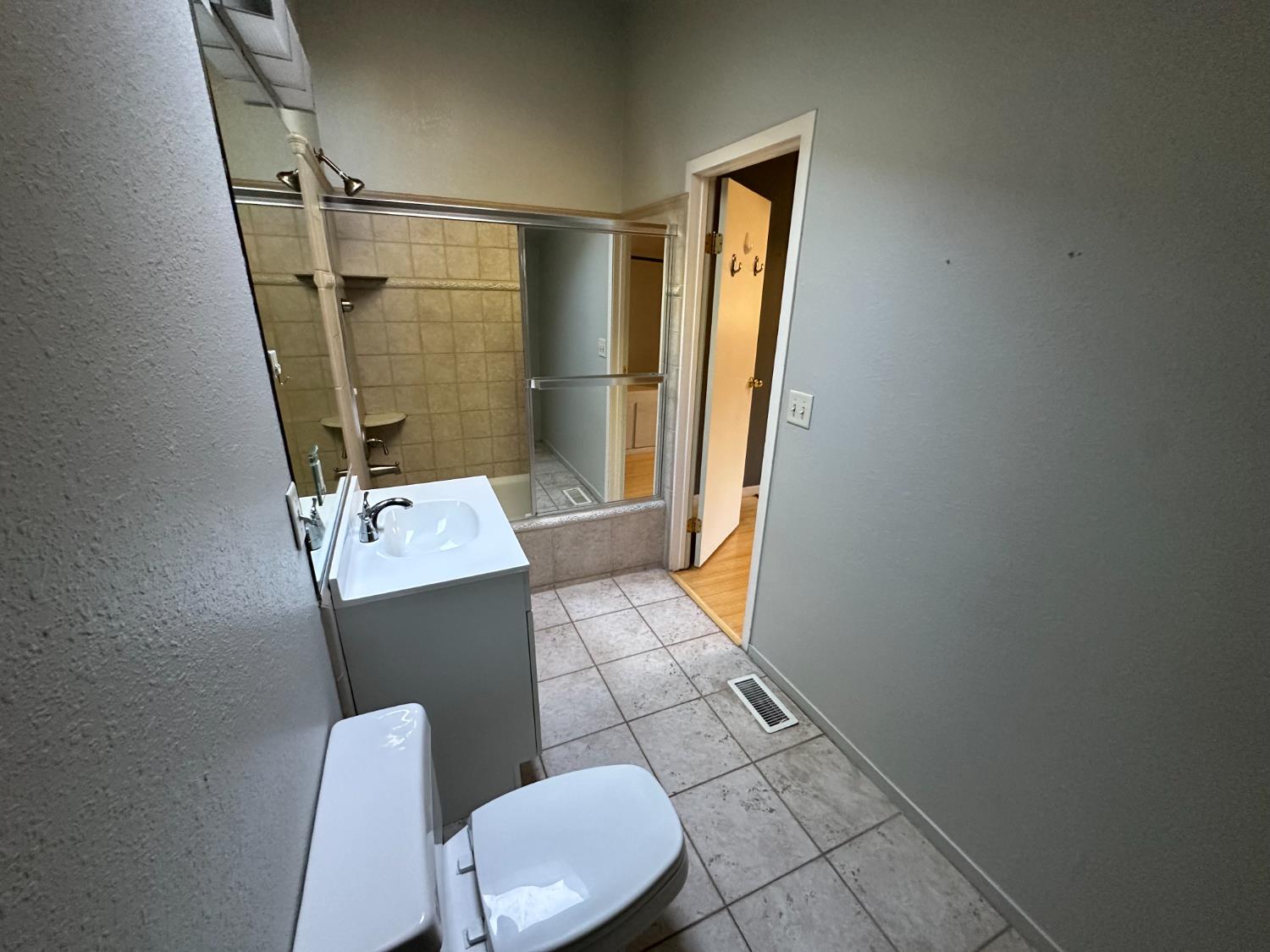 878 Rheinfelder Street Portola, CA 96122 - Photo 27 of 36 a bathroom with a sink and toilet