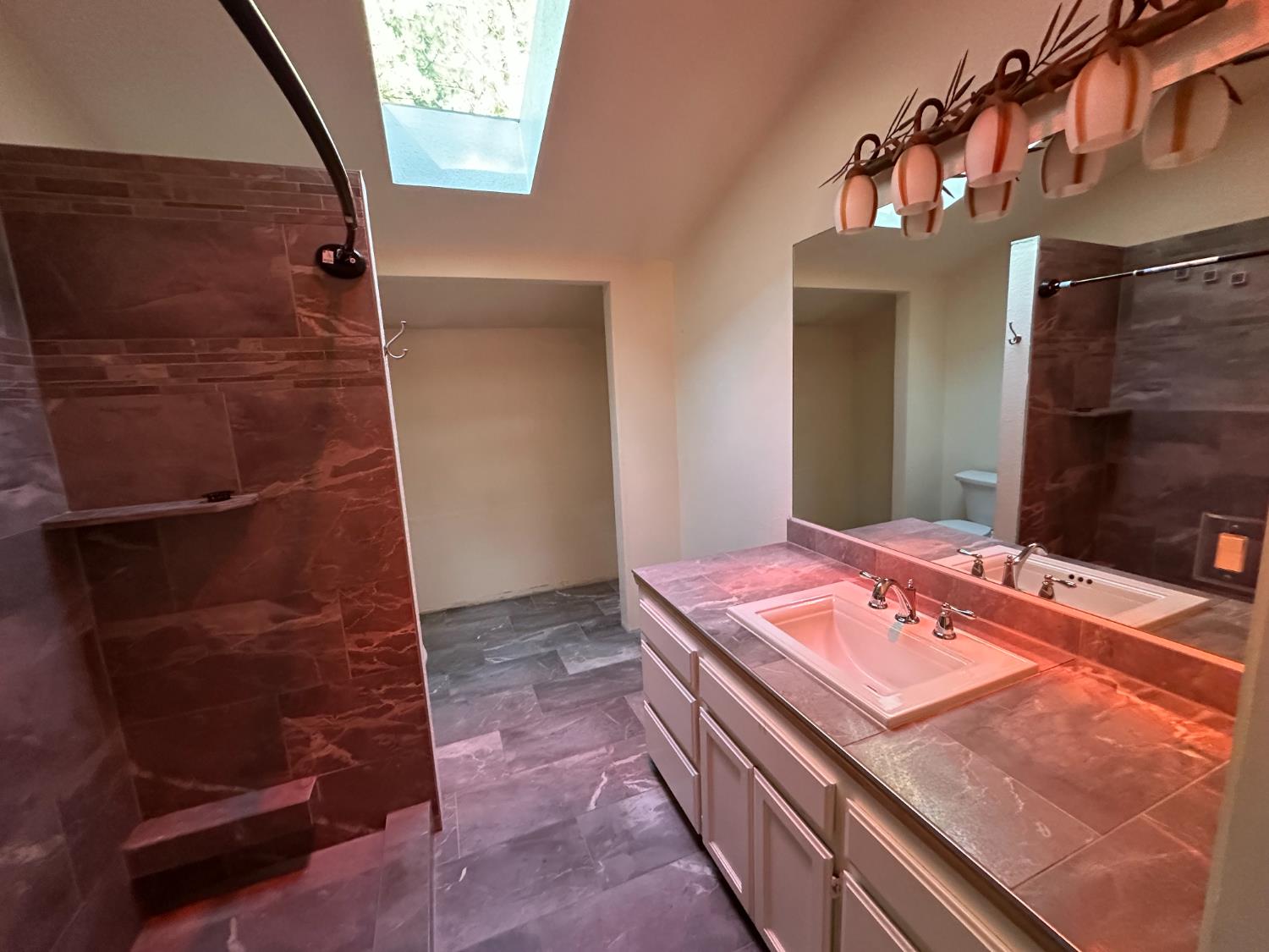 878 Rheinfelder Street Portola, CA 96122 - Photo 31 of 36 a bedroom with a bed and a shower