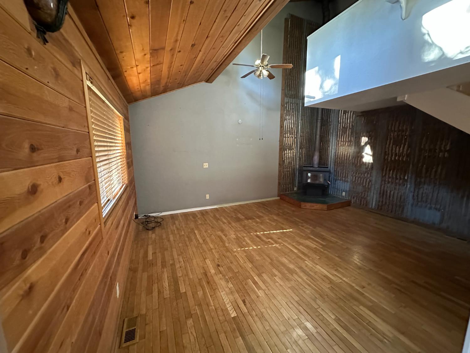 878 Rheinfelder Street Portola, CA 96122 - Photo 8 of 36 a view of an empty room with glass door