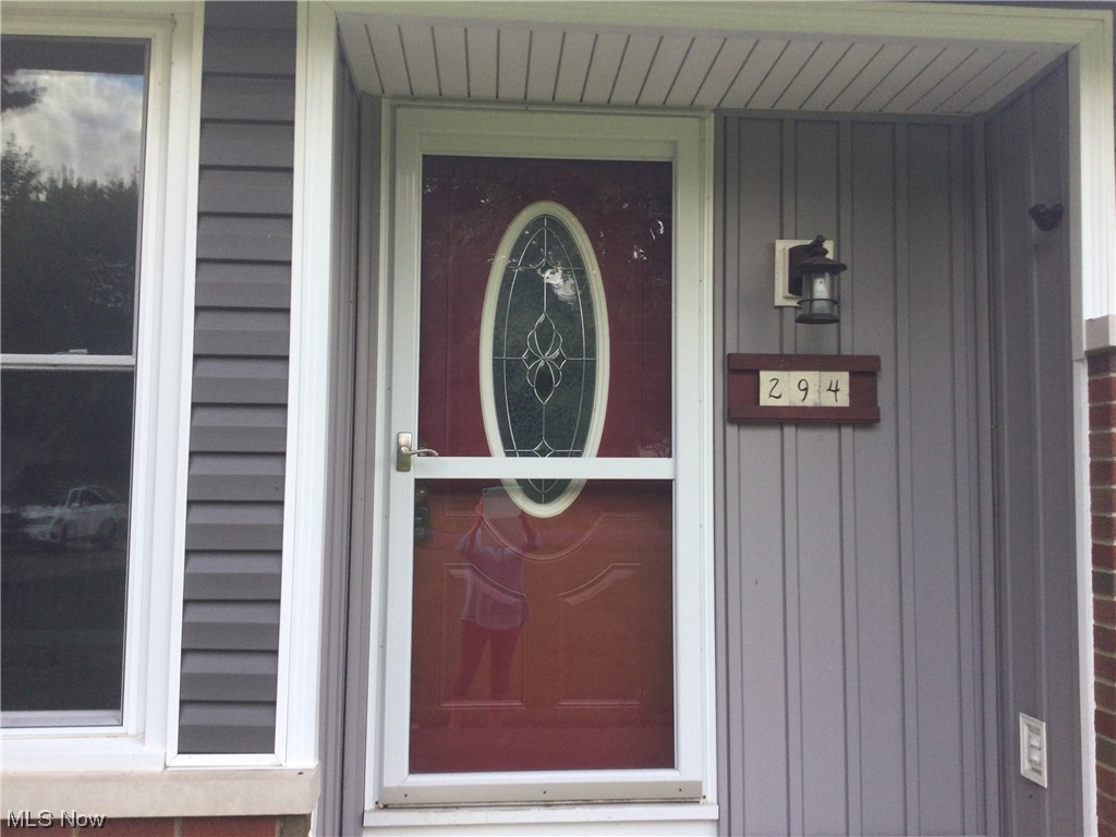 294 Lester Road New Franklin, OH 44319 - Photo 2 of 24 Property entrance featuring a porch