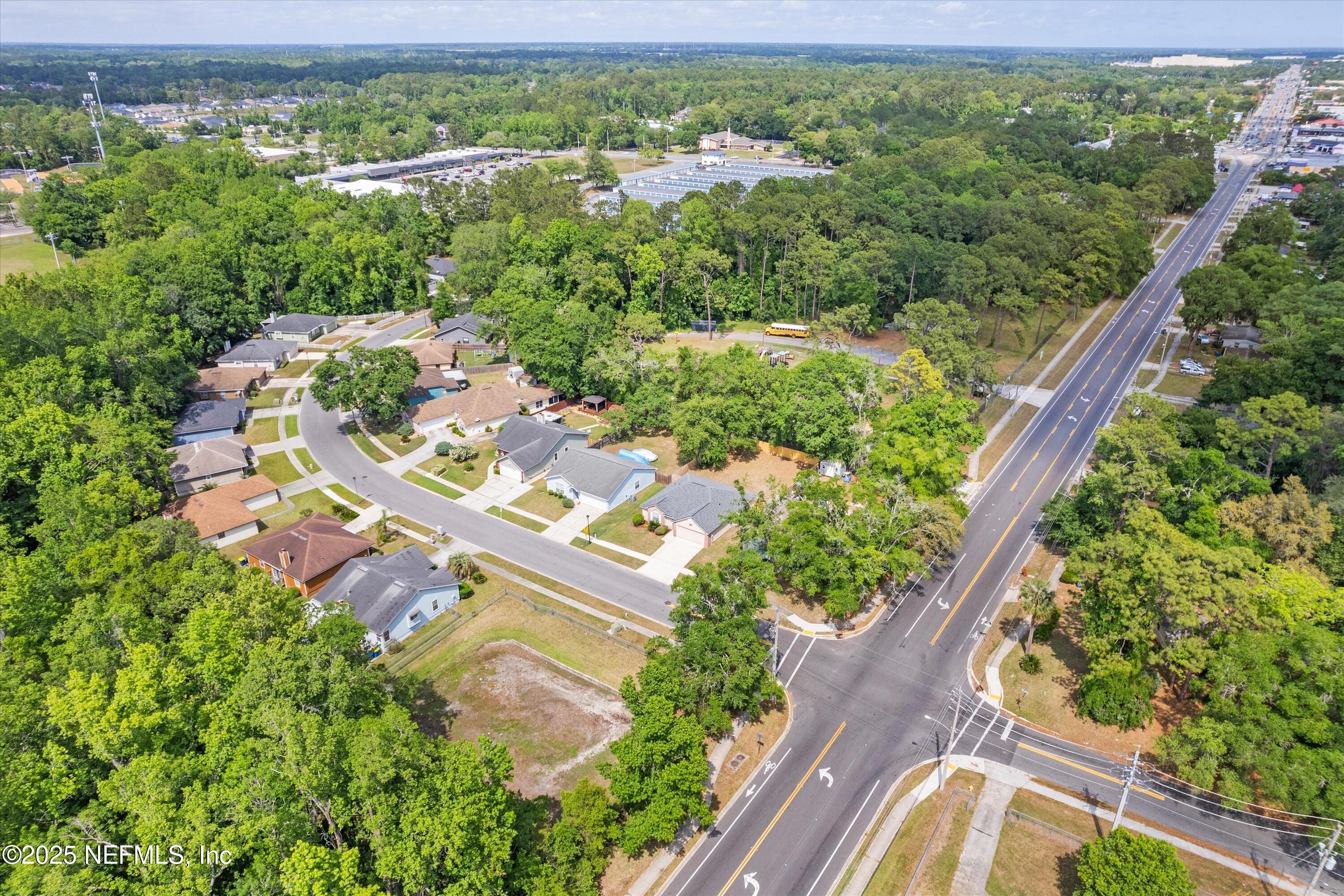 10713 Rutgers Road Jacksonville, FL 32218 - Photo 25 of 26 an aerial view of residential houses with outdoor space and street view