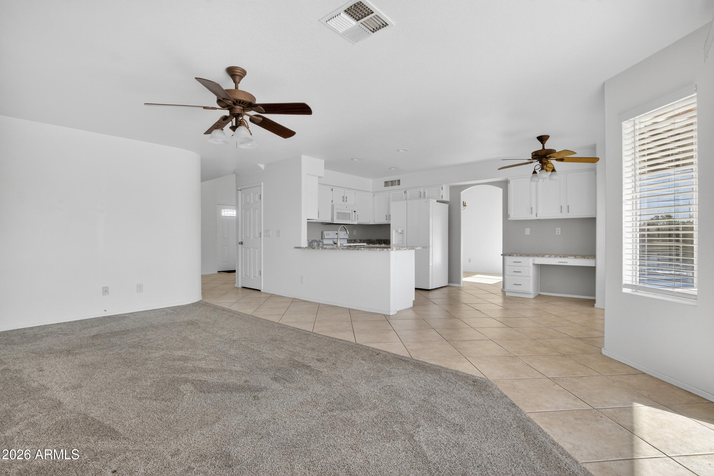 1363 East Butler Circle Chandler, AZ 85225 - Photo 12 of 41 a view of a kitchen with a sink and cabinets