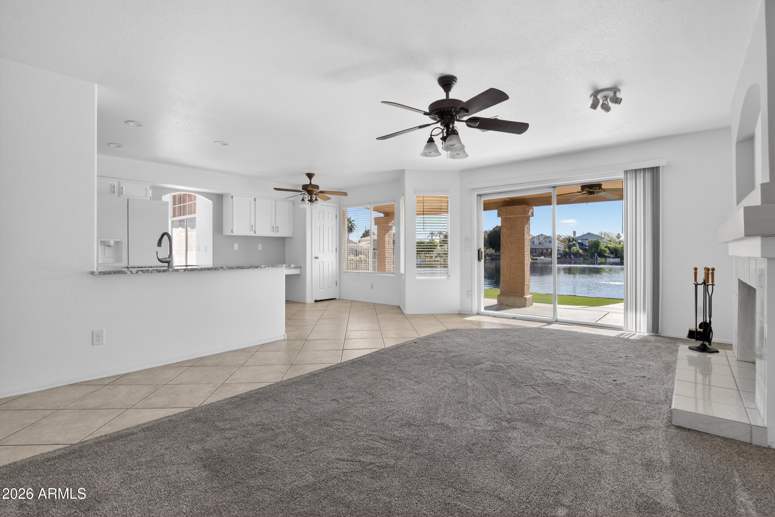 1363 East Butler Circle Chandler, AZ 85225 - Photo 13 of 41 a view of a livingroom with a ceiling fan and window