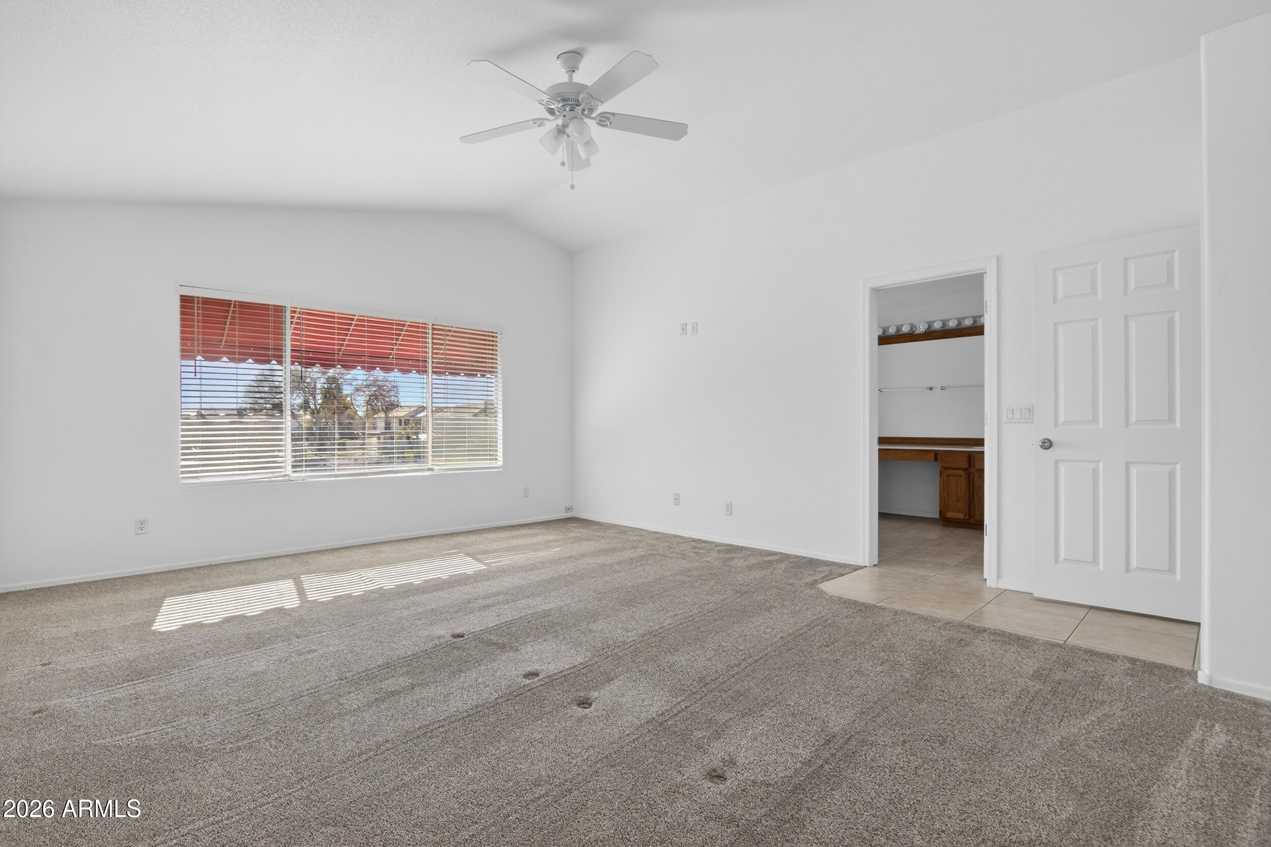 1363 East Butler Circle Chandler, AZ 85225 - Photo 16 of 41 an empty room with windows and cabinet