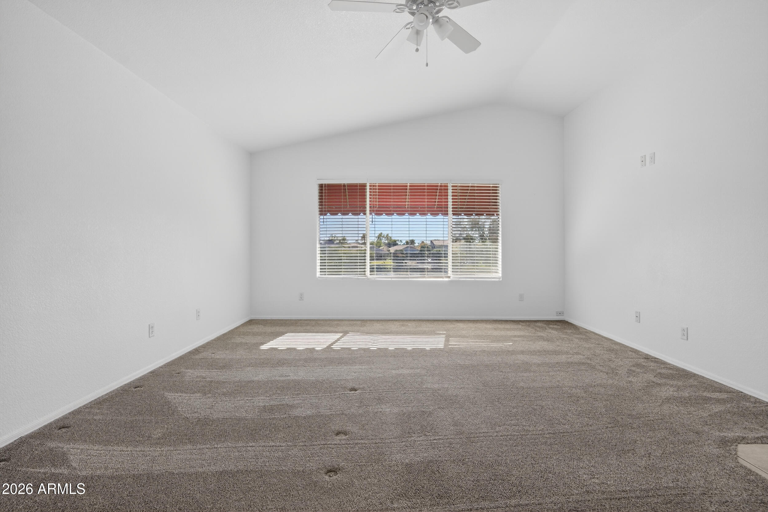 1363 East Butler Circle Chandler, AZ 85225 - Photo 18 of 41 an empty room with fan and windows