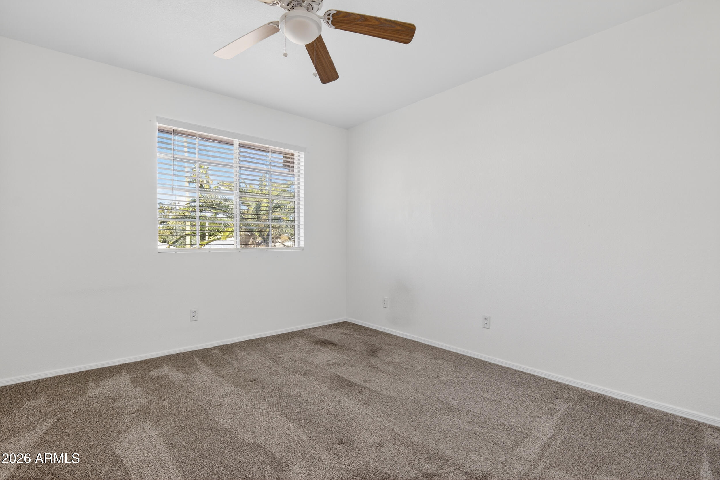 1363 East Butler Circle Chandler, AZ 85225 - Photo 23 of 41 an empty room with a window