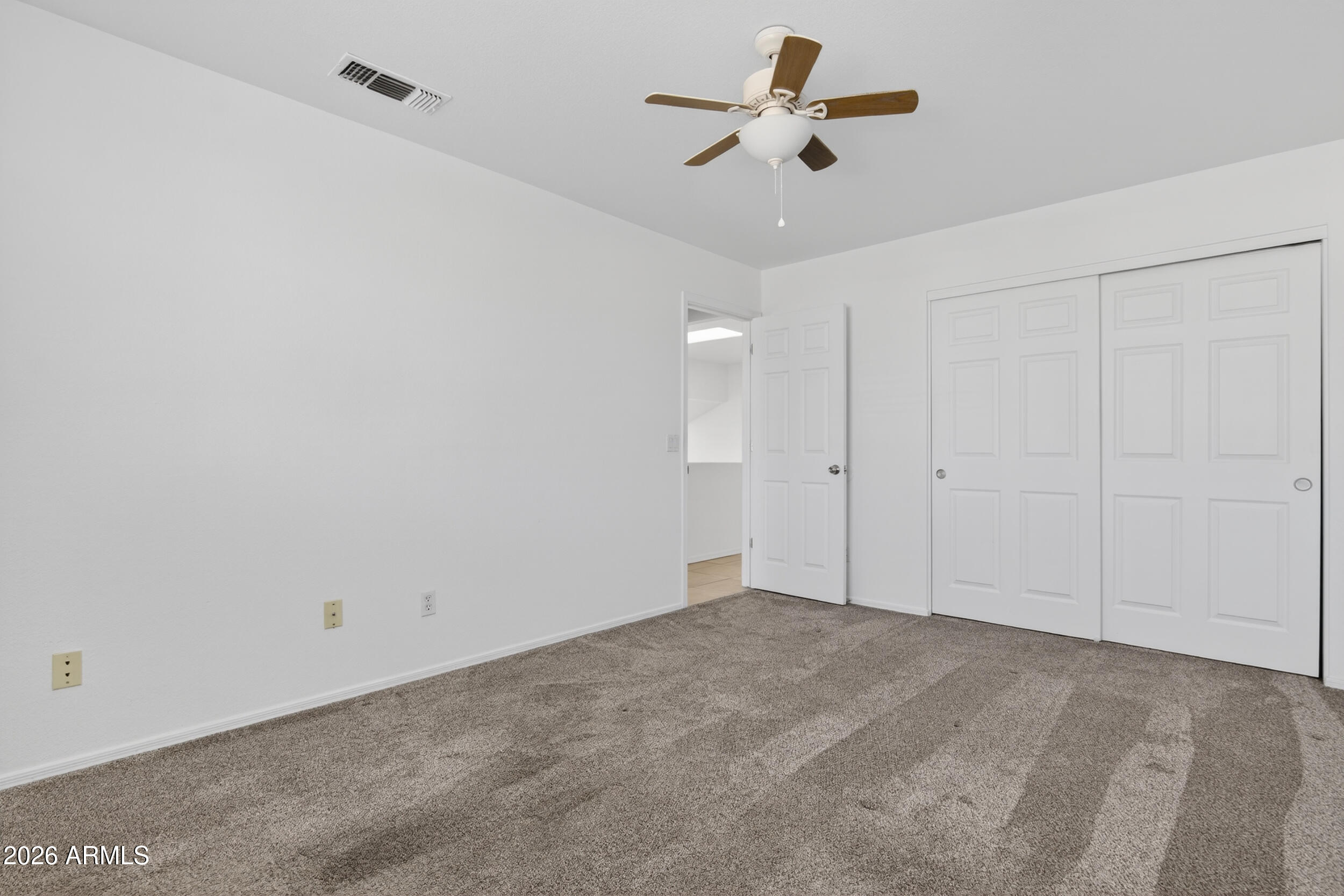 1363 East Butler Circle Chandler, AZ 85225 - Photo 26 of 41 a view of a big room with carpet