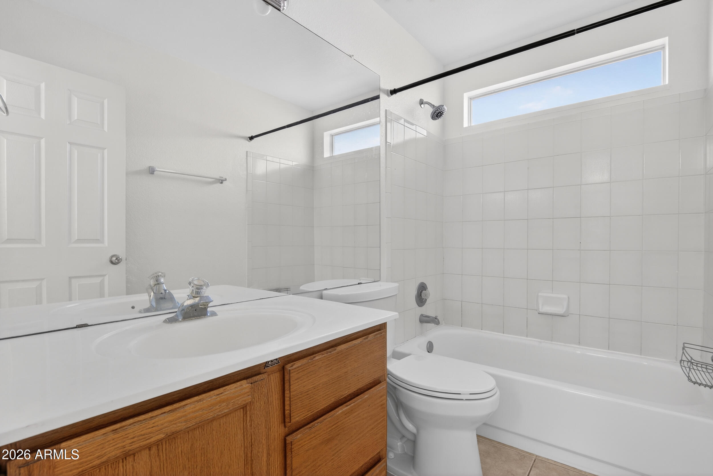 1363 East Butler Circle Chandler, AZ 85225 - Photo 27 of 41 a bathroom with a sink a toilet and a bathtub
