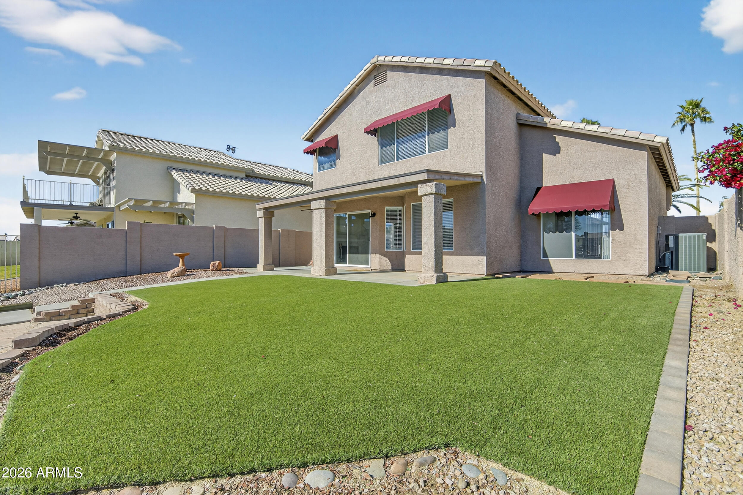 1363 East Butler Circle Chandler, AZ 85225 - Photo 3 of 41 a view of an house with backyard porch and furniture