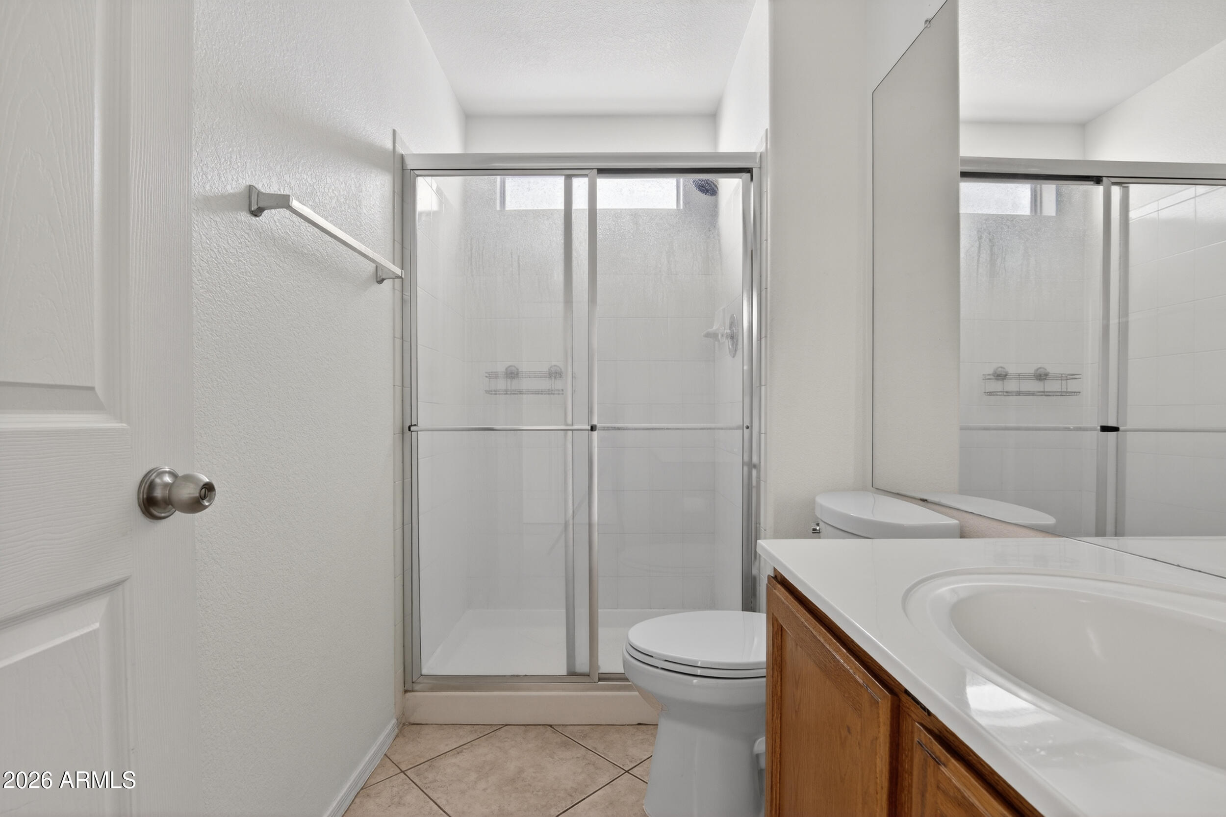 1363 East Butler Circle Chandler, AZ 85225 - Photo 32 of 41 a bathroom with a sink a toilet and shower
