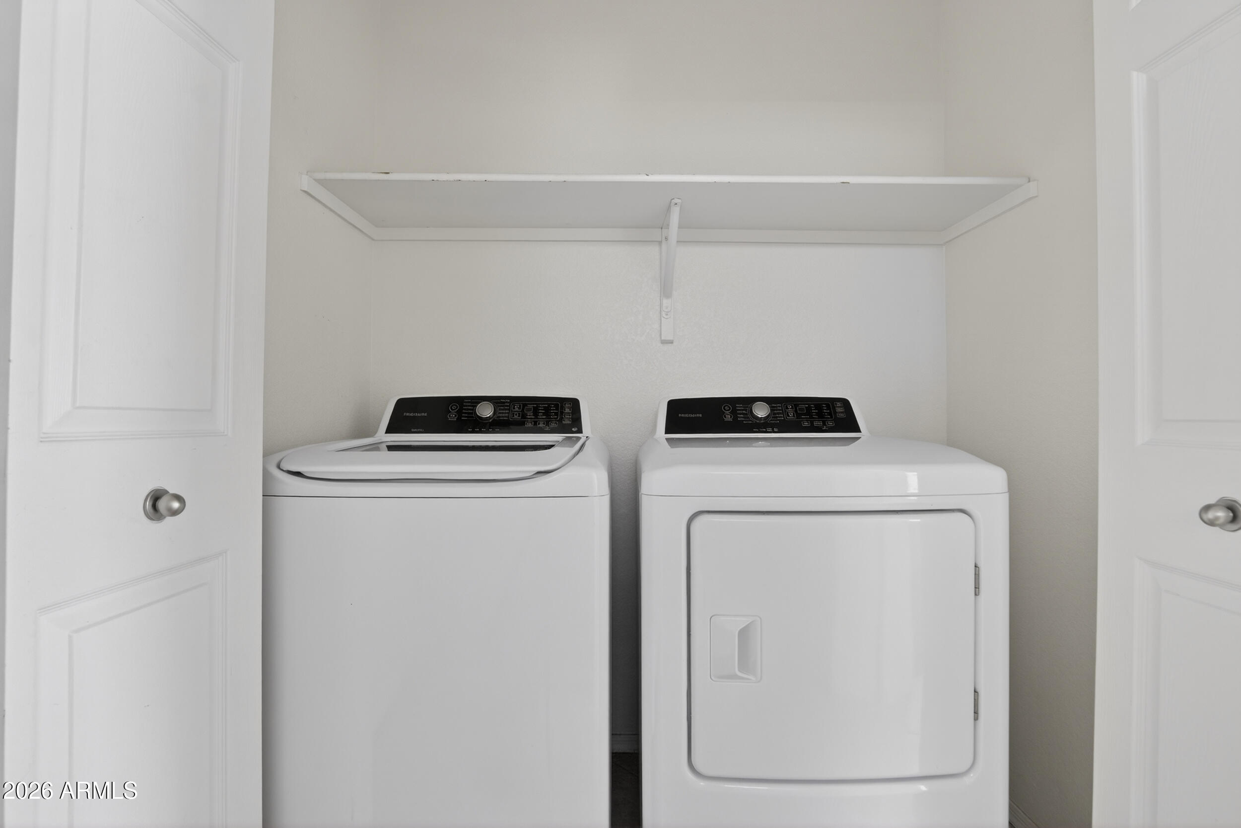 1363 East Butler Circle Chandler, AZ 85225 - Photo 33 of 41 a utility room with dryer and washer