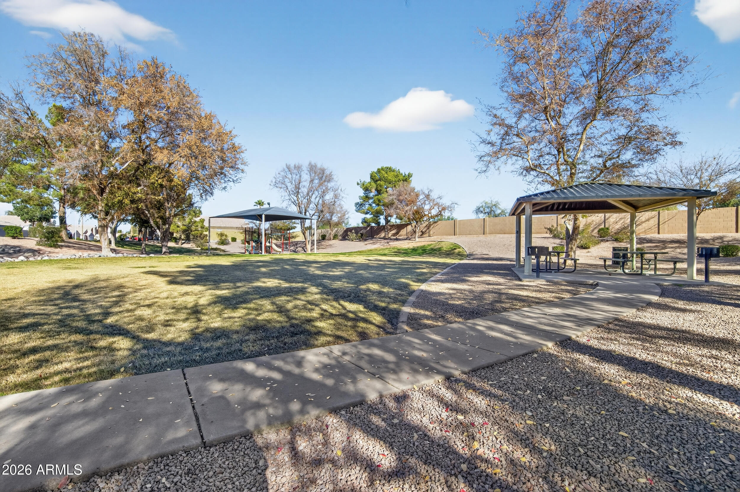 1363 East Butler Circle Chandler, AZ 85225 - Photo 39 of 41 a view of a yard with a slide