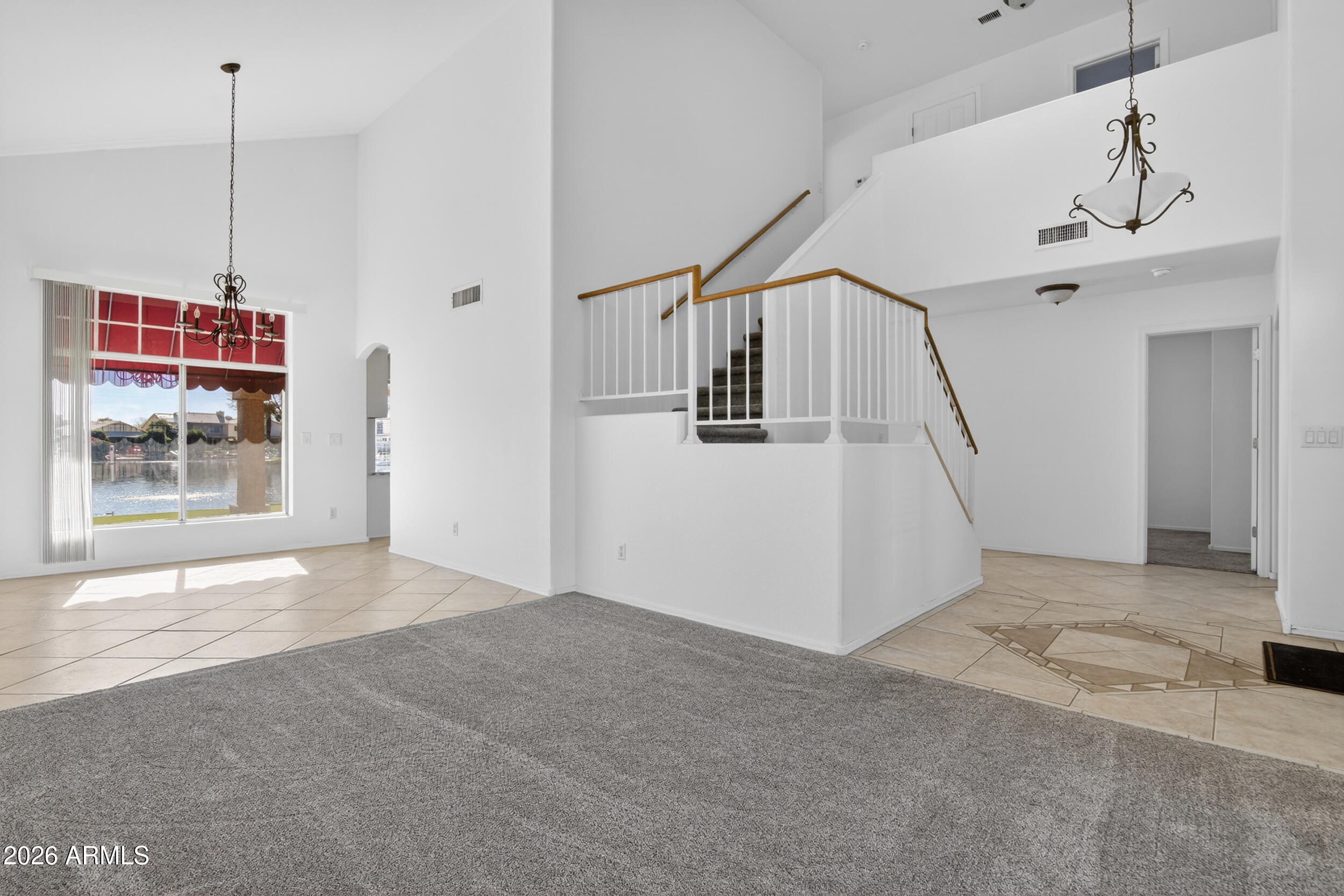 1363 East Butler Circle Chandler, AZ 85225 - Photo 5 of 41 a view of an empty room with a window
