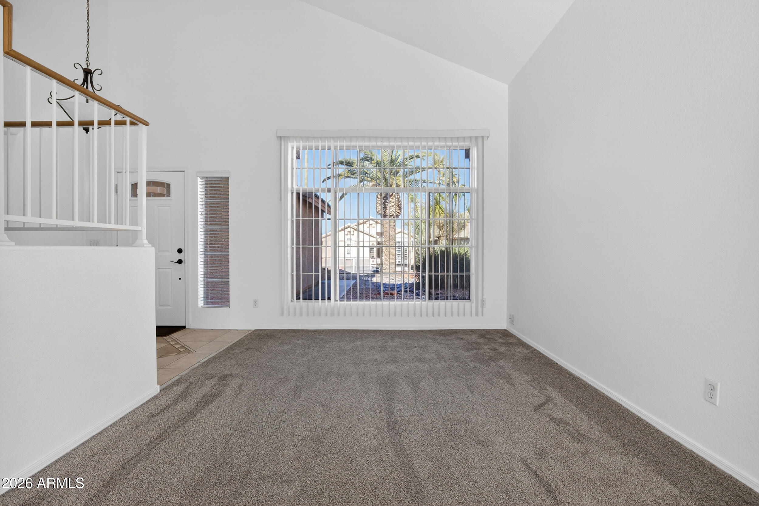 1363 East Butler Circle Chandler, AZ 85225 - Photo 6 of 41 a view of an empty room with a window