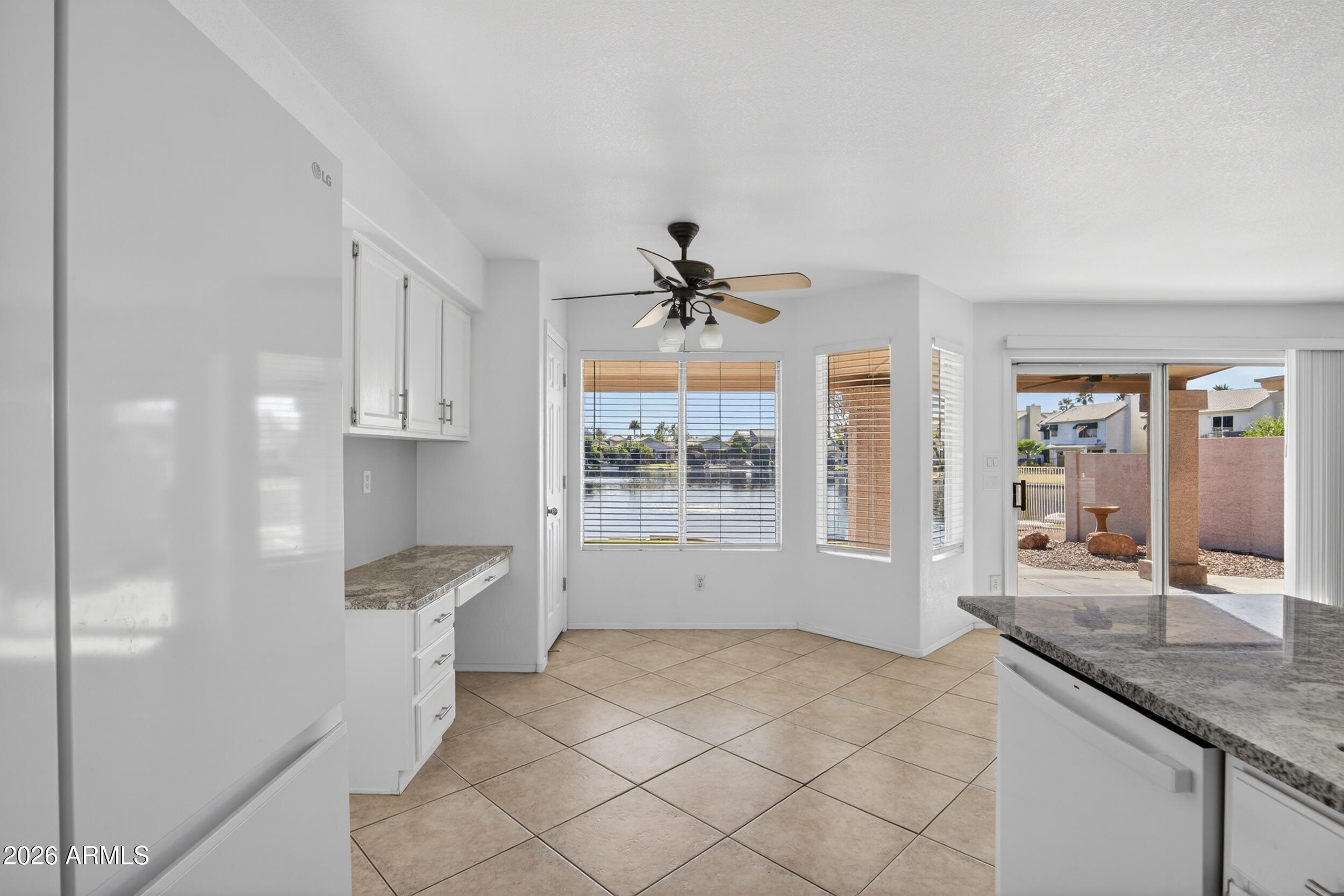 1363 East Butler Circle Chandler, AZ 85225 - Photo 10 of 41 a view of empty room with wooden floor and fan