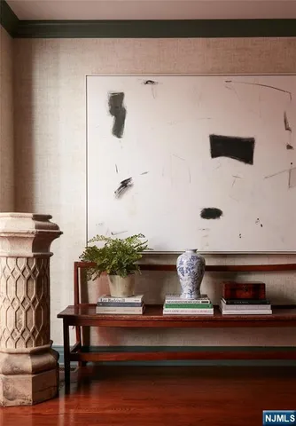 a view of utility room with wooden floor