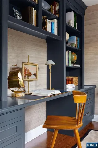 a view of a workspace with furniture