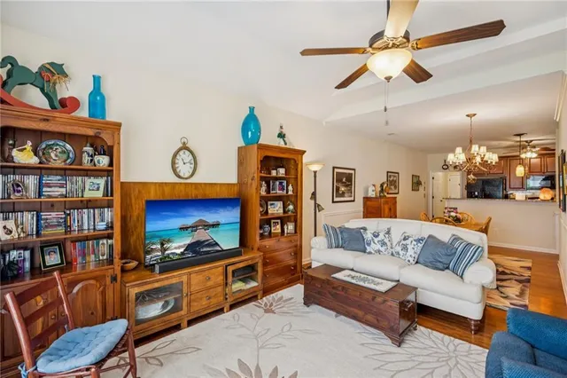 a kitchen with granite countertop stainless steel appliances and a refrigerator
