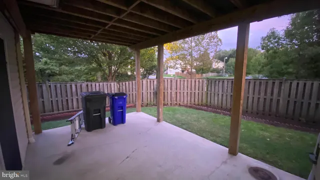 a view of porch with a swing