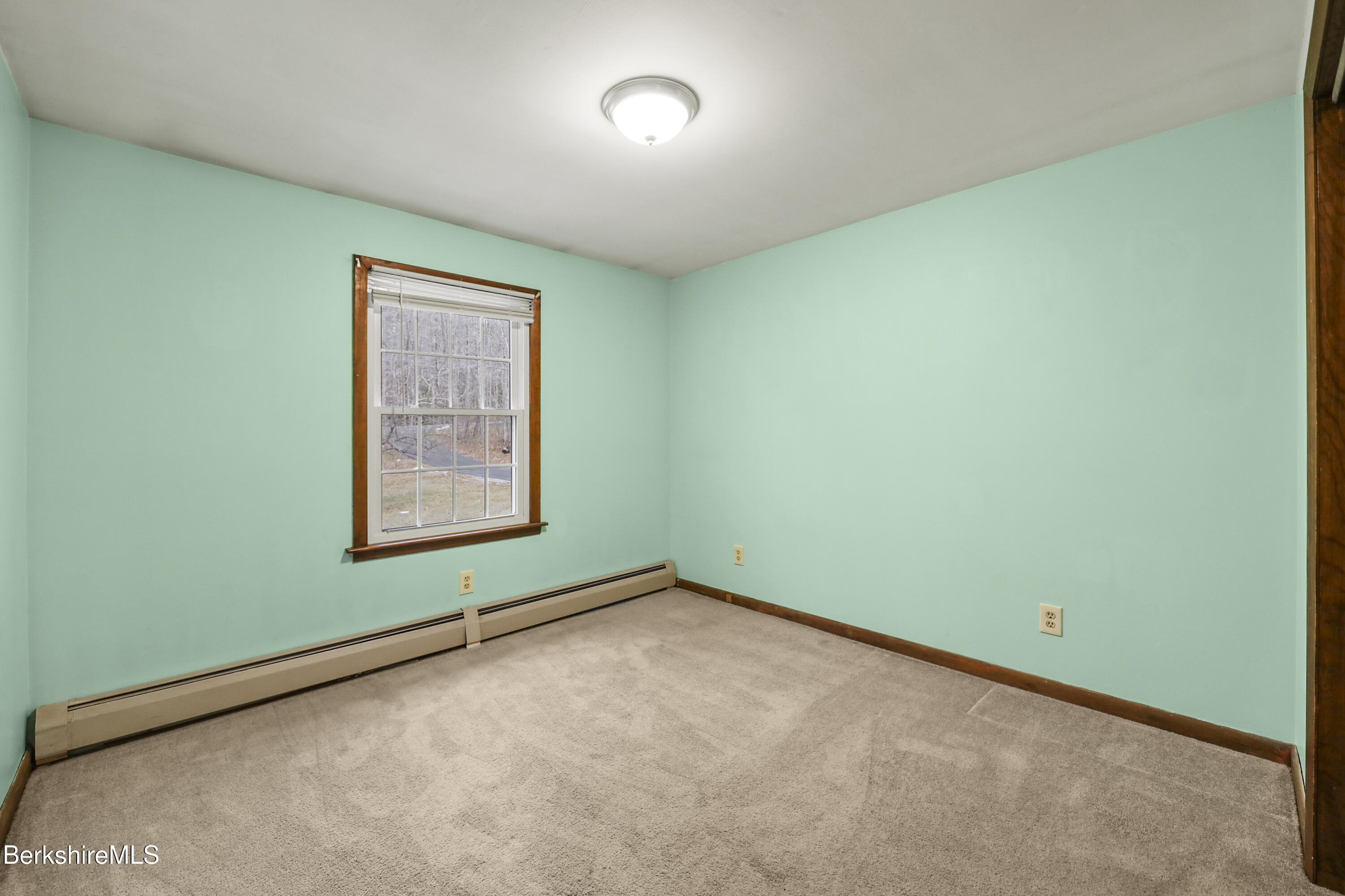 2271 Jacobs Ladder Road Becket, MA 01223 - Photo 15 of 28 an empty room with a window