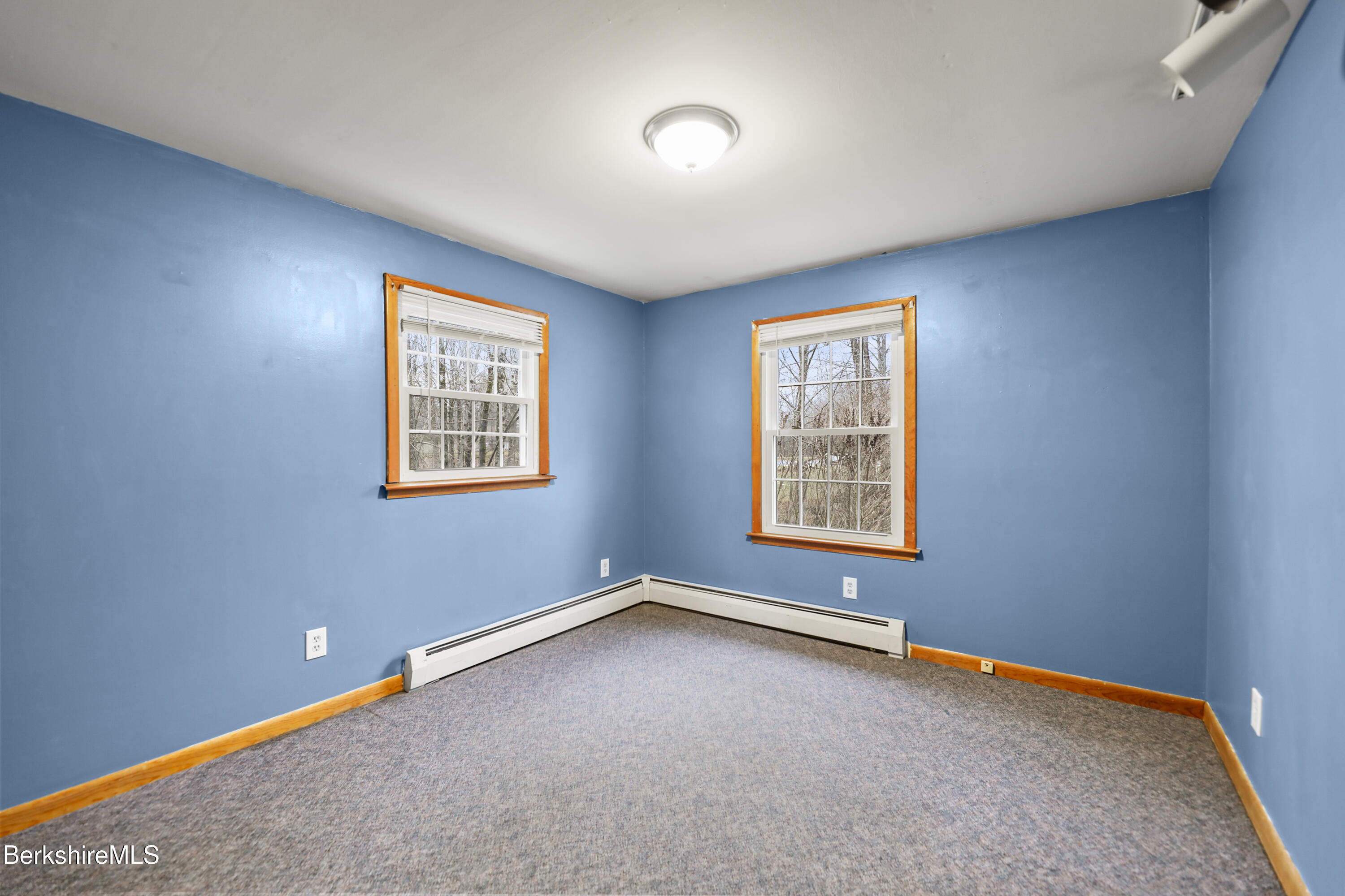 2271 Jacobs Ladder Road Becket, MA 01223 - Photo 20 of 28 a view of an empty room with a window