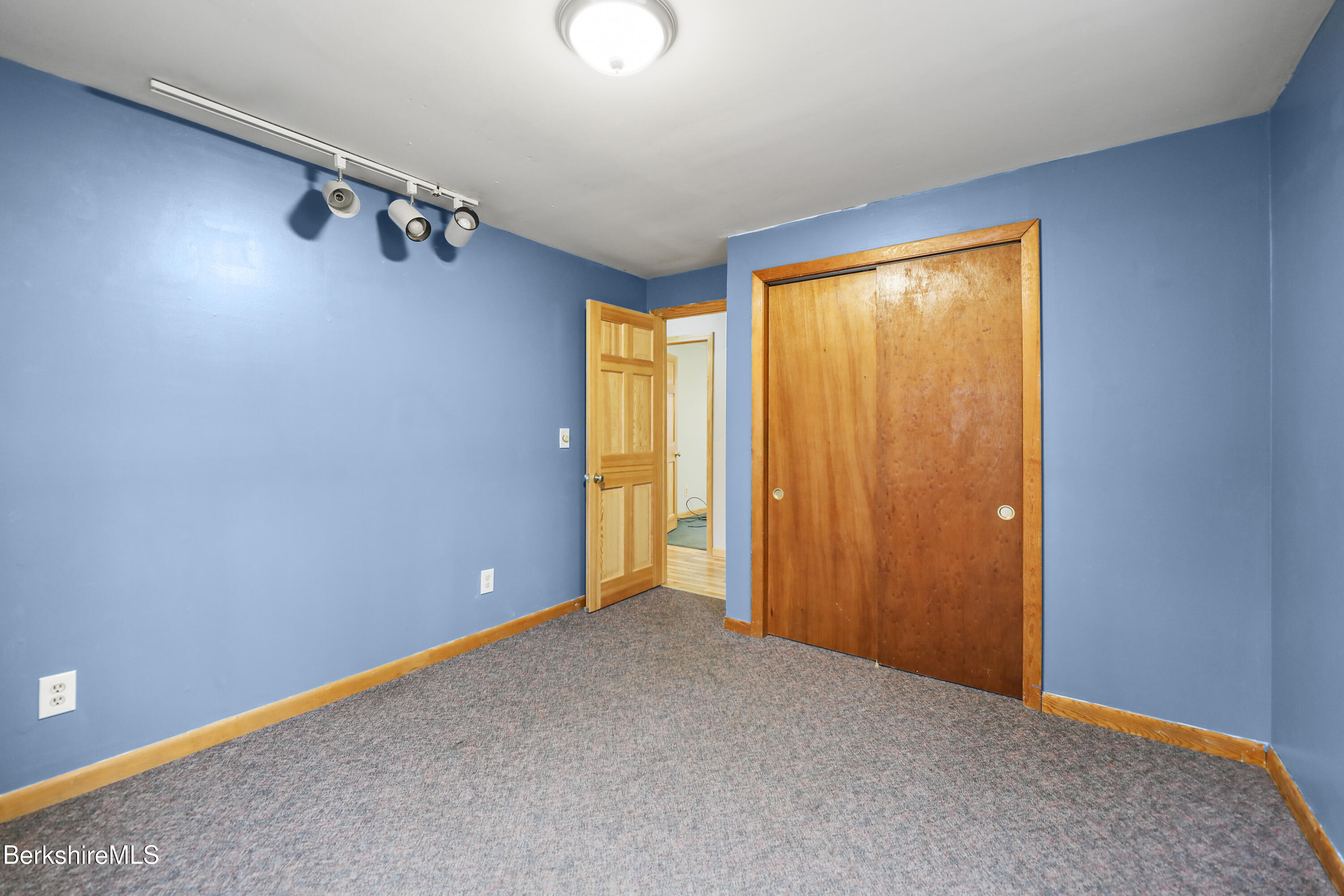 2271 Jacobs Ladder Road Becket, MA 01223 - Photo 21 of 28 an empty room with a empty space and a window