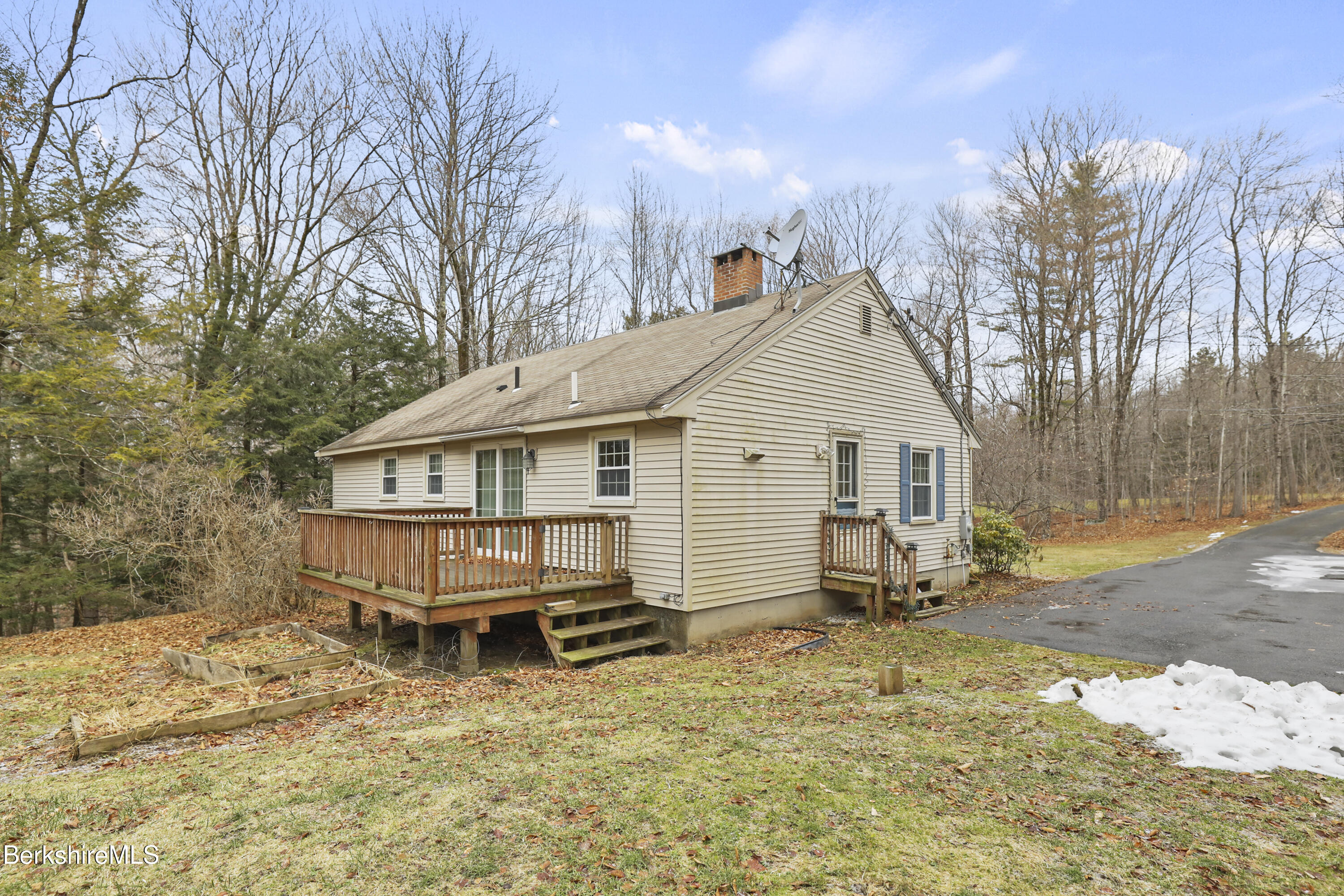 2271 Jacobs Ladder Road Becket, MA 01223 - Photo 23 of 28 a view of a house with a yard