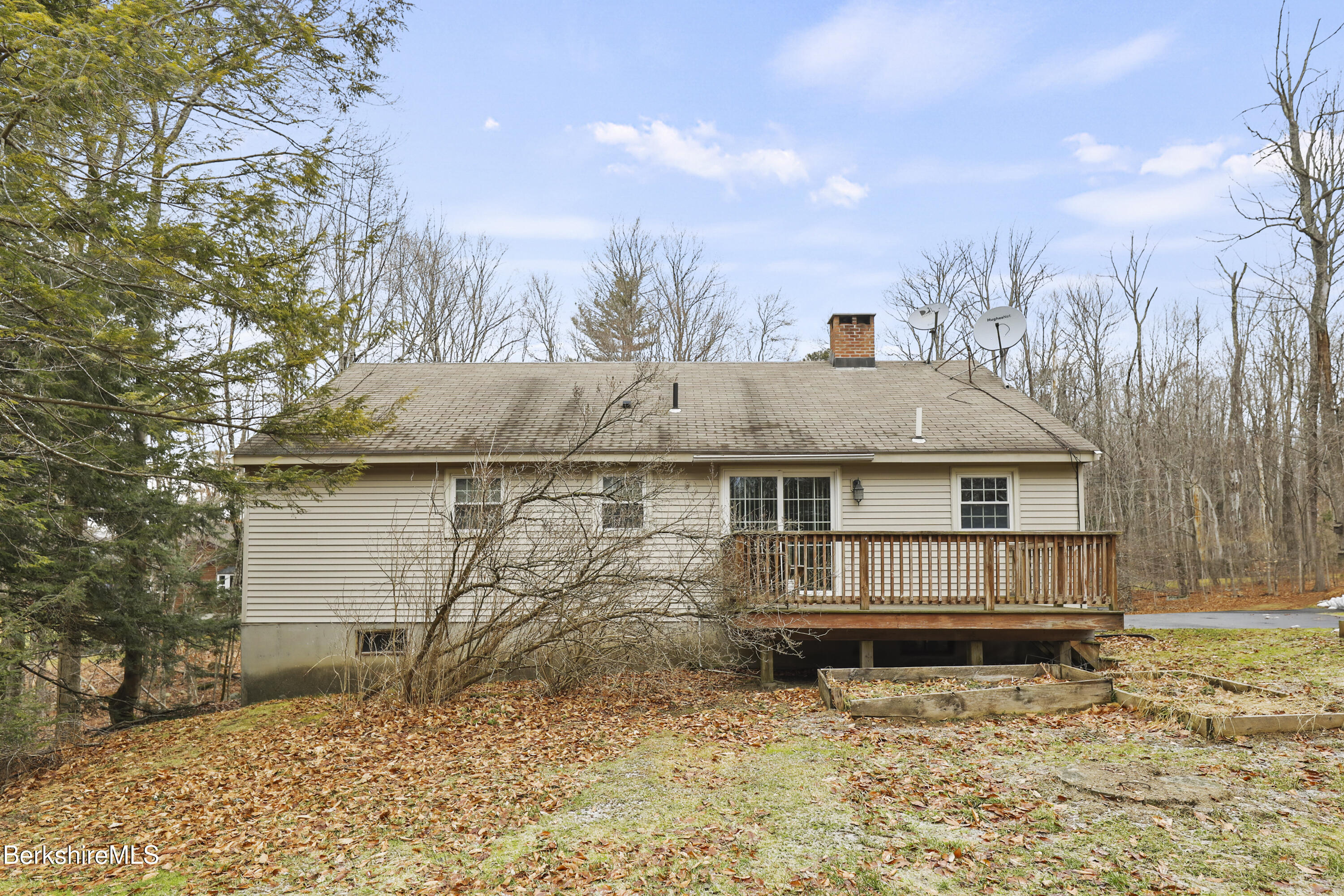 2271 Jacobs Ladder Road Becket, MA 01223 - Photo 24 of 28 front view of a house with a yard