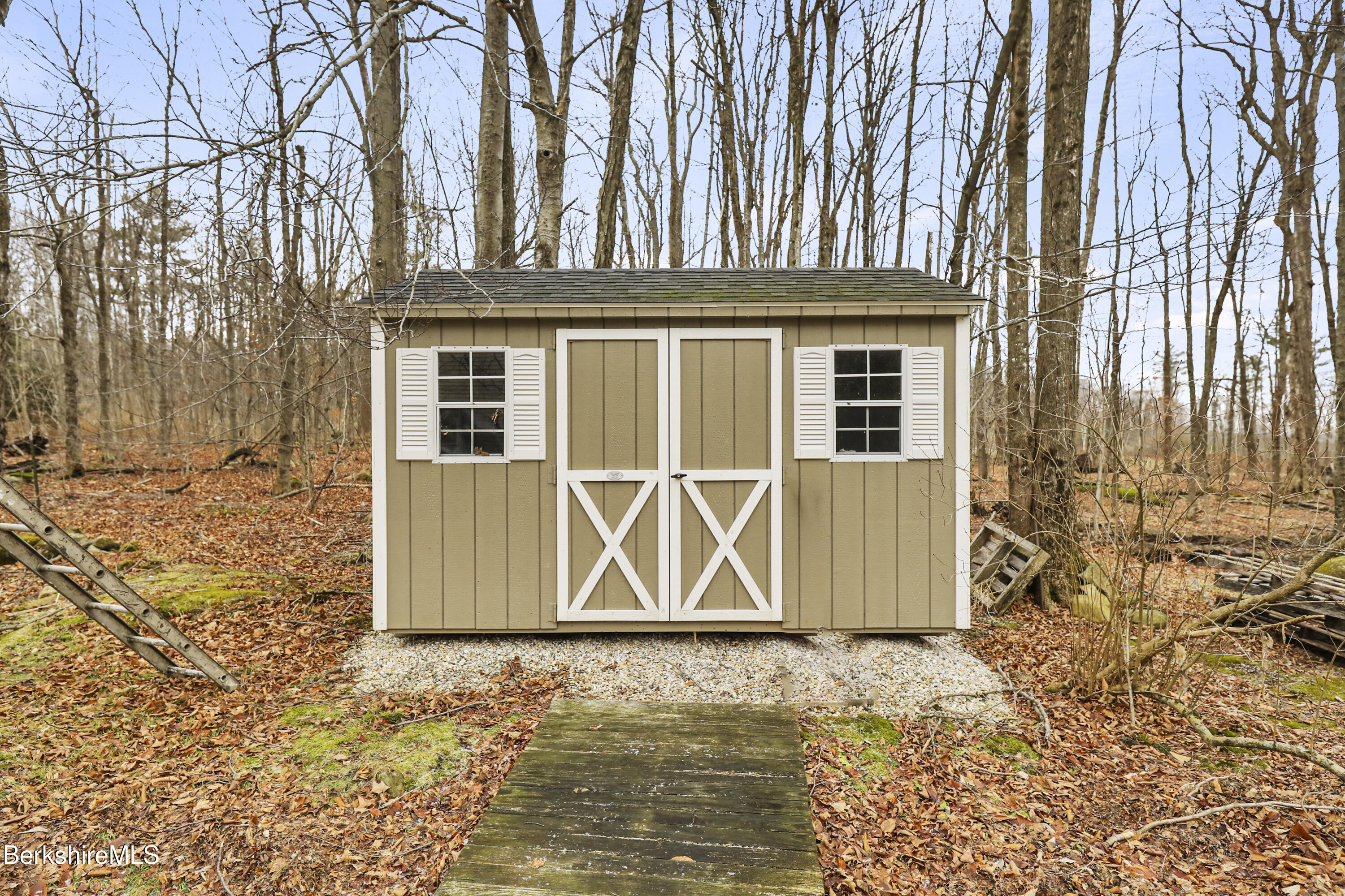 2271 Jacobs Ladder Road Becket, MA 01223 - Photo 28 of 28 a view of a house with a door