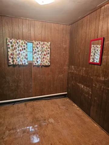 a view of a backyard with sitting area