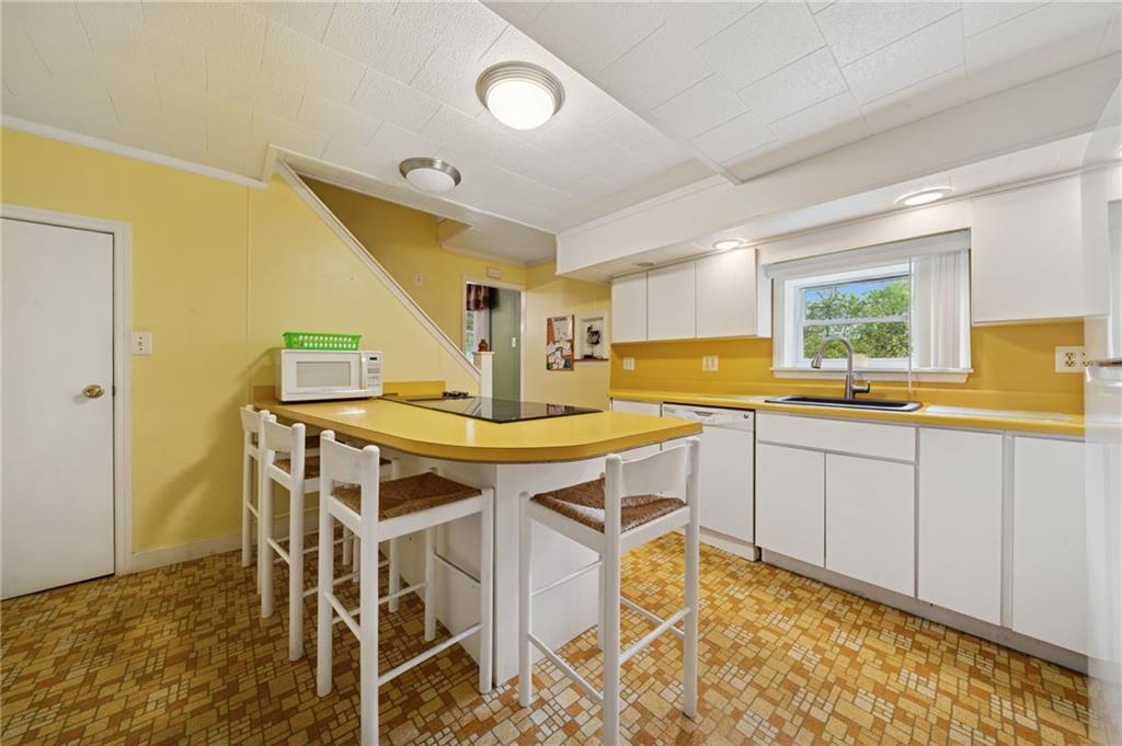 4314 Rostosky Ridge Road Monongahela, PA 15063 - Photo 12 of 38 a kitchen with a table and chairs in it