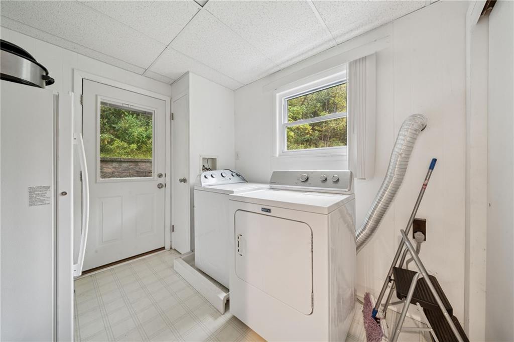 4314 Rostosky Ridge Road Monongahela, PA 15063 - Photo 16 of 38 a view of a hallway with washer and dryer