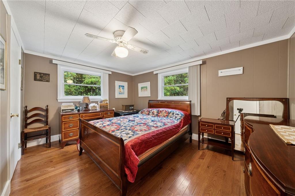 4314 Rostosky Ridge Road Monongahela, PA 15063 - Photo 23 of 38 a bedroom with a bed and a dresser next to a window