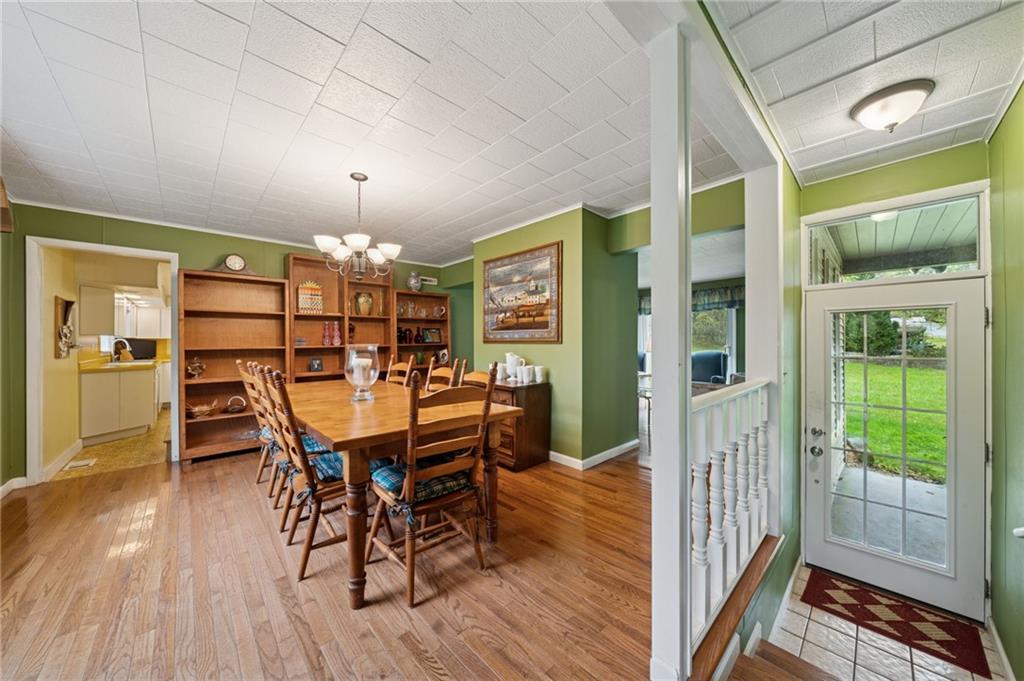 4314 Rostosky Ridge Road Monongahela, PA 15063 - Photo 6 of 38 a view of a dining room with furniture and wooden floor