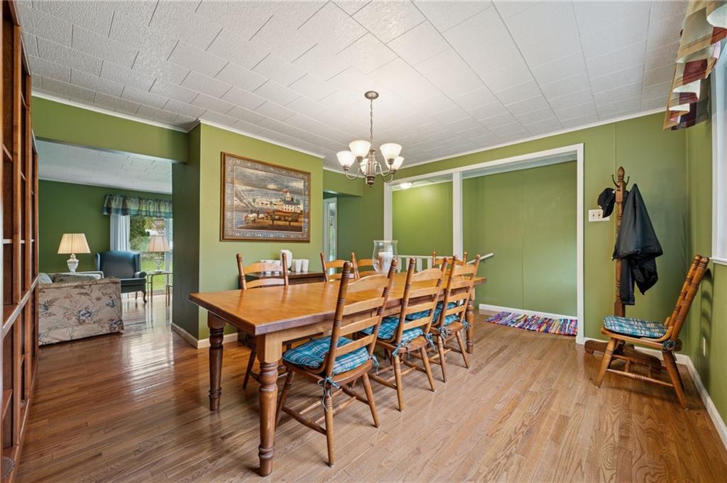 4314 Rostosky Ridge Road Monongahela, PA 15063 - Photo 8 of 38 a dining room with furniture window and wooden floor