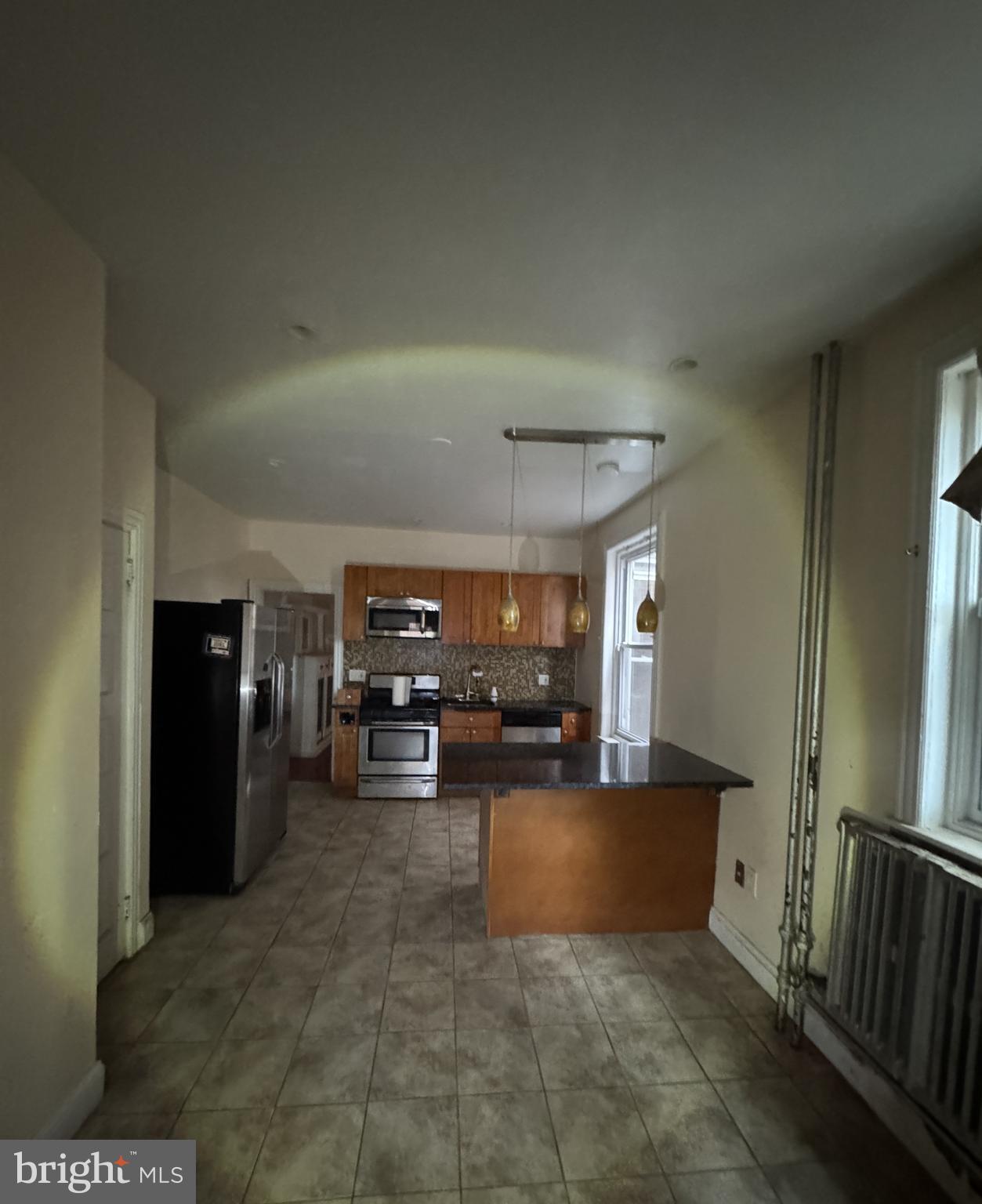 4935 Pulaski Avenue Philadelphia, PA 19144 - Photo 13 of 22 a view of a livingroom with furniture wooden floor and furniture