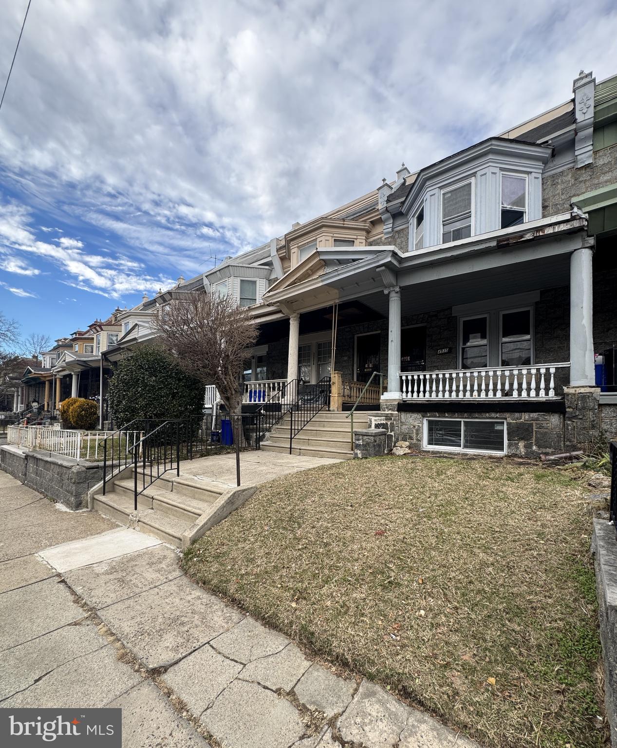 4935 Pulaski Avenue Philadelphia, PA 19144 - Photo 3 of 22 a backyard of a house with barbeque oven table and chairs
