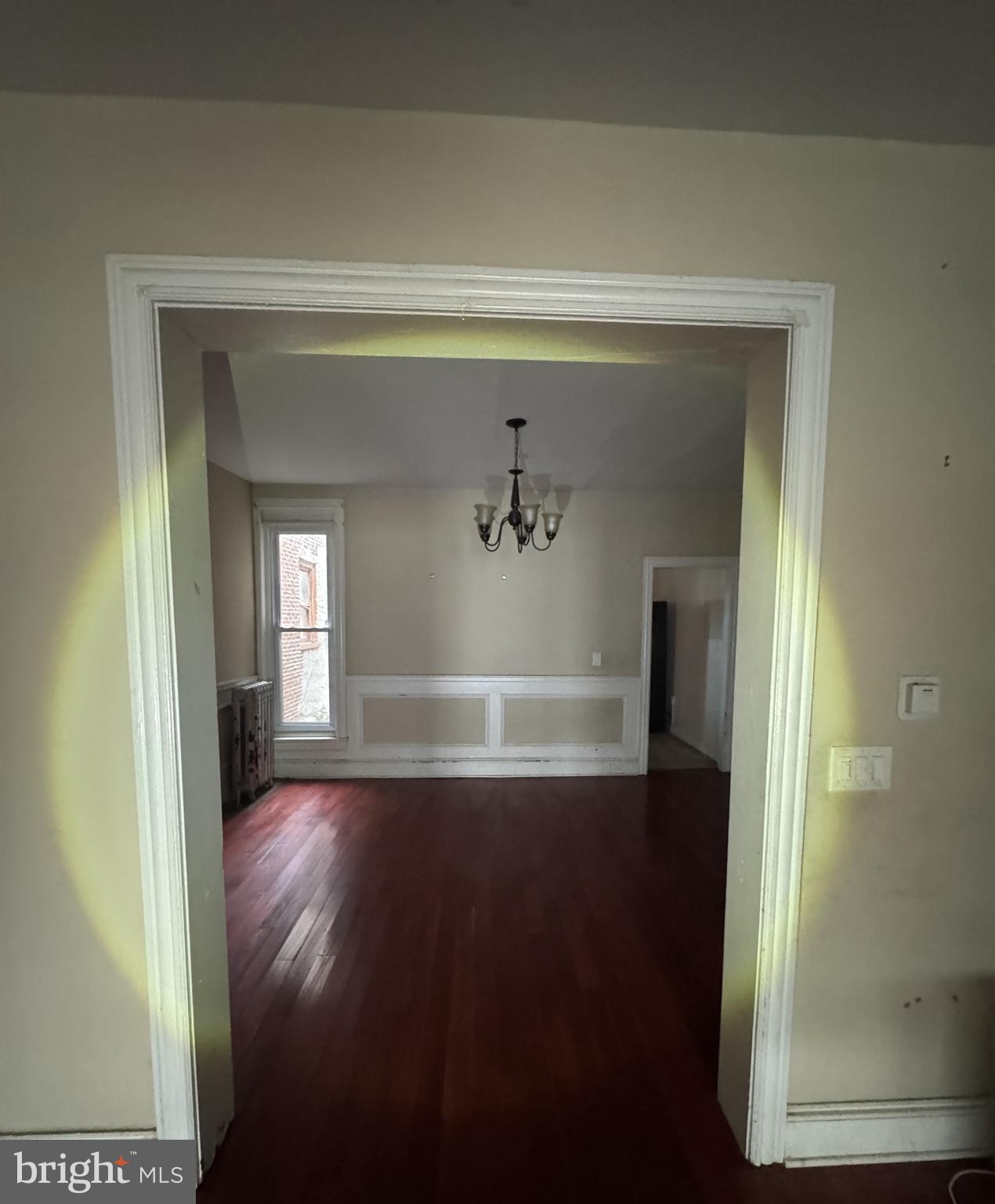 4935 Pulaski Avenue Philadelphia, PA 19144 - Photo 9 of 22 a view of empty room with wooden floor and fan