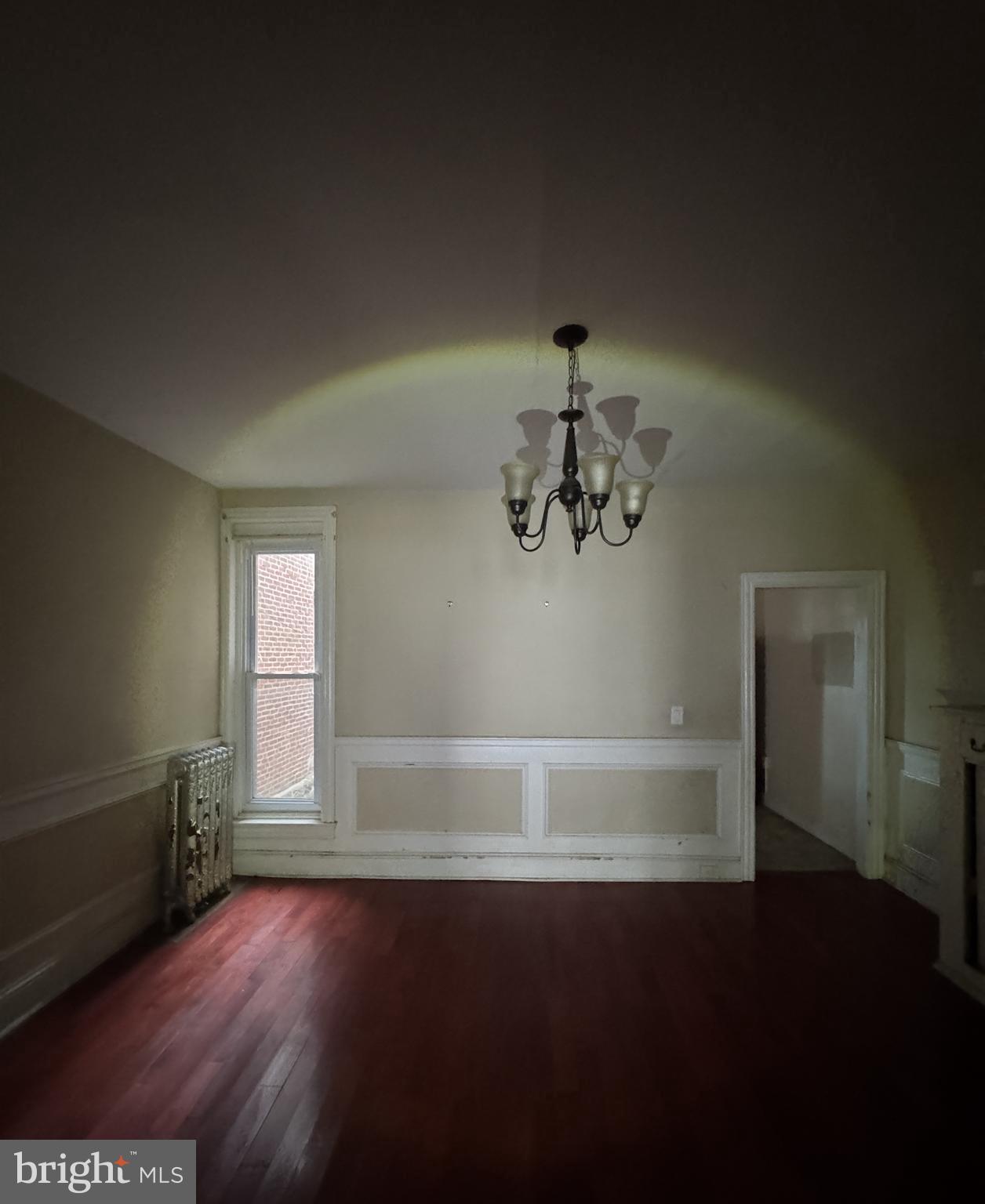 4935 Pulaski Avenue Philadelphia, PA 19144 - Photo 10 of 22 a view of a livingroom with wooden floor and a window