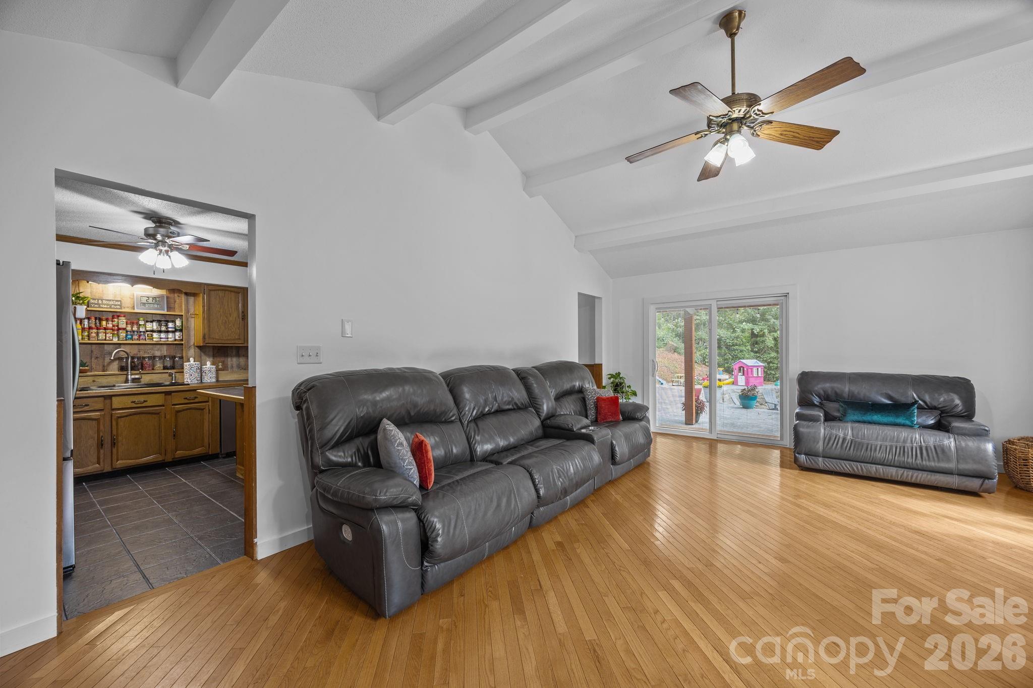 263 Morgan Branch Road, Unit 1 Leicester, NC 28748 - Photo 8 of 31 a living room with furniture and a wooden floor