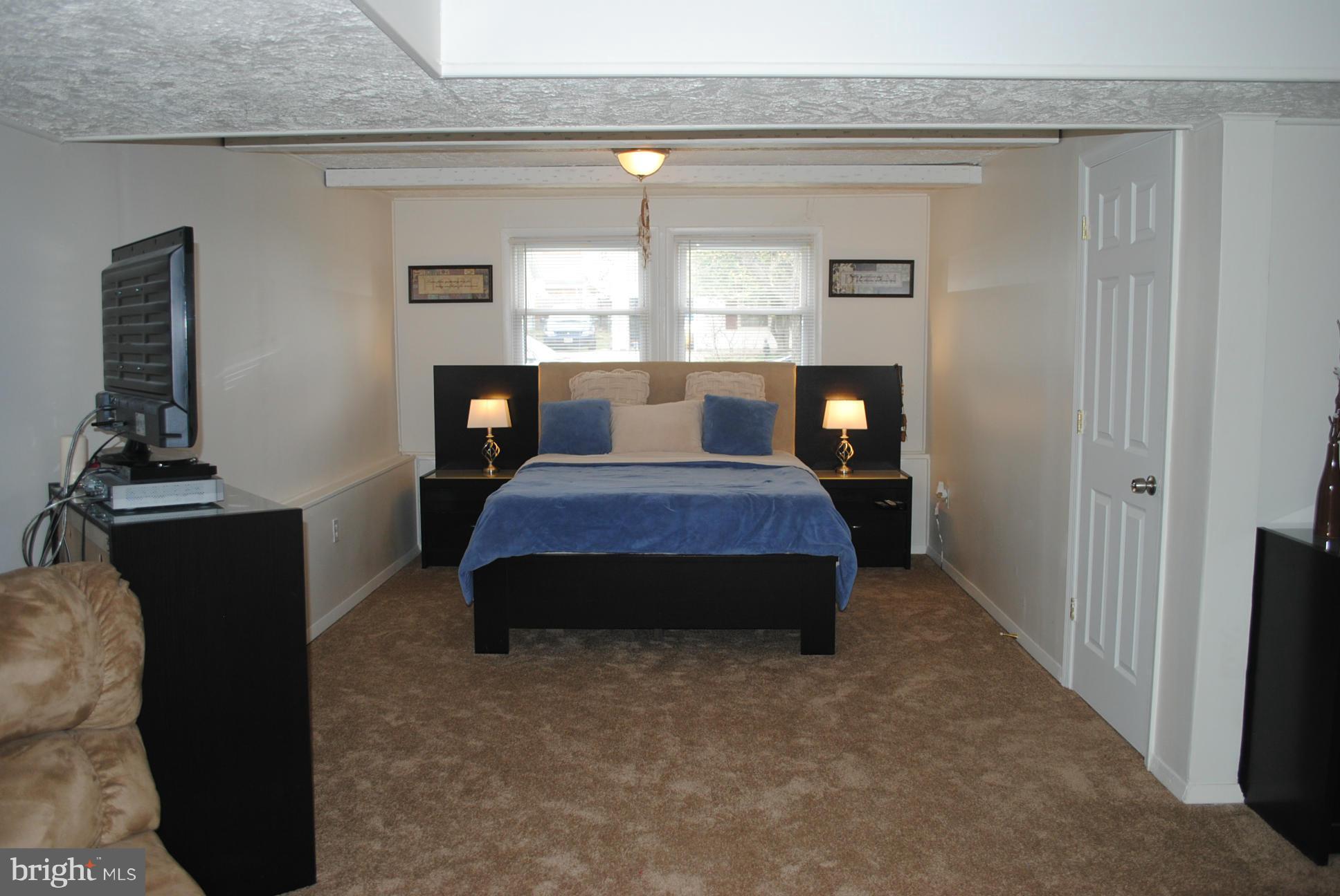 7913 Coventry Road Severn, MD 21144 - Photo 13 of 21 Family Room ( currently used as master bedroom)