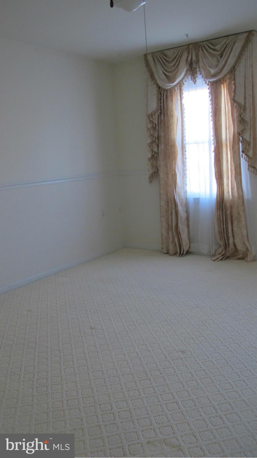 2902 Seminole Road Woodbridge, VA 22192 - Photo 9 of 24 a view of a room with wooden floor and windows