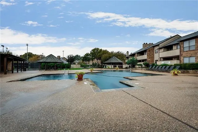 a view of street with houses